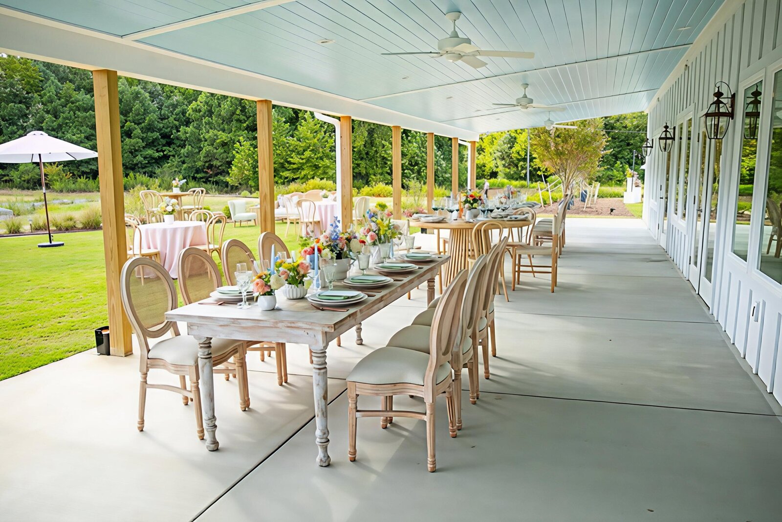 Veranda-Farm-Table-Flowers-White-Barn-Style-Venue-The-Legacy-at-Willow-Pond.JPG