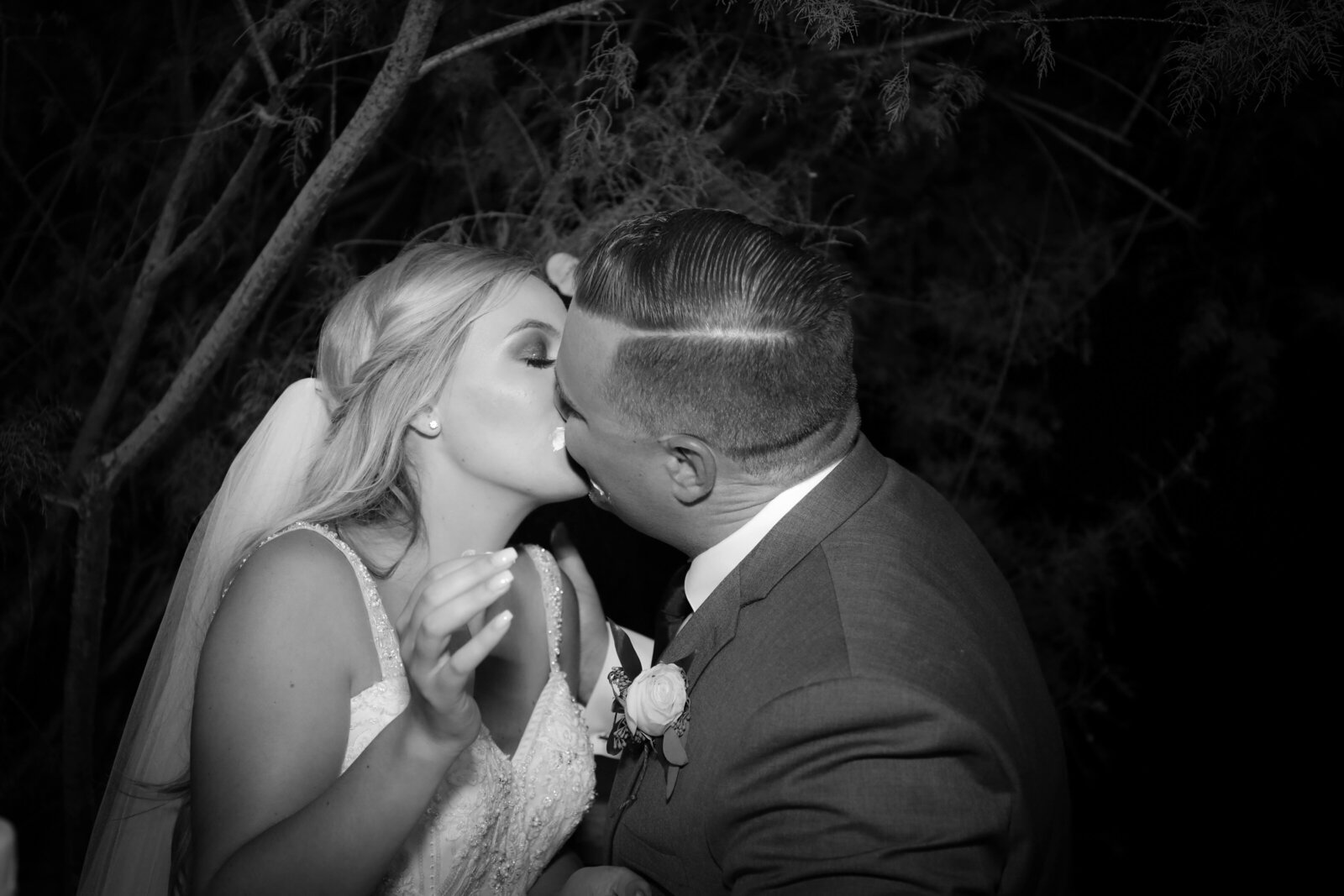 Newport Beach Family Photographer photo of bride and groom kissing in black and white