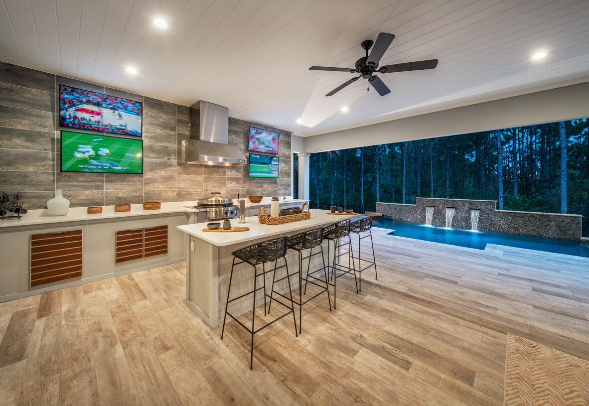 Luxury pool and outdoor kitchen entertainment area in North Florida