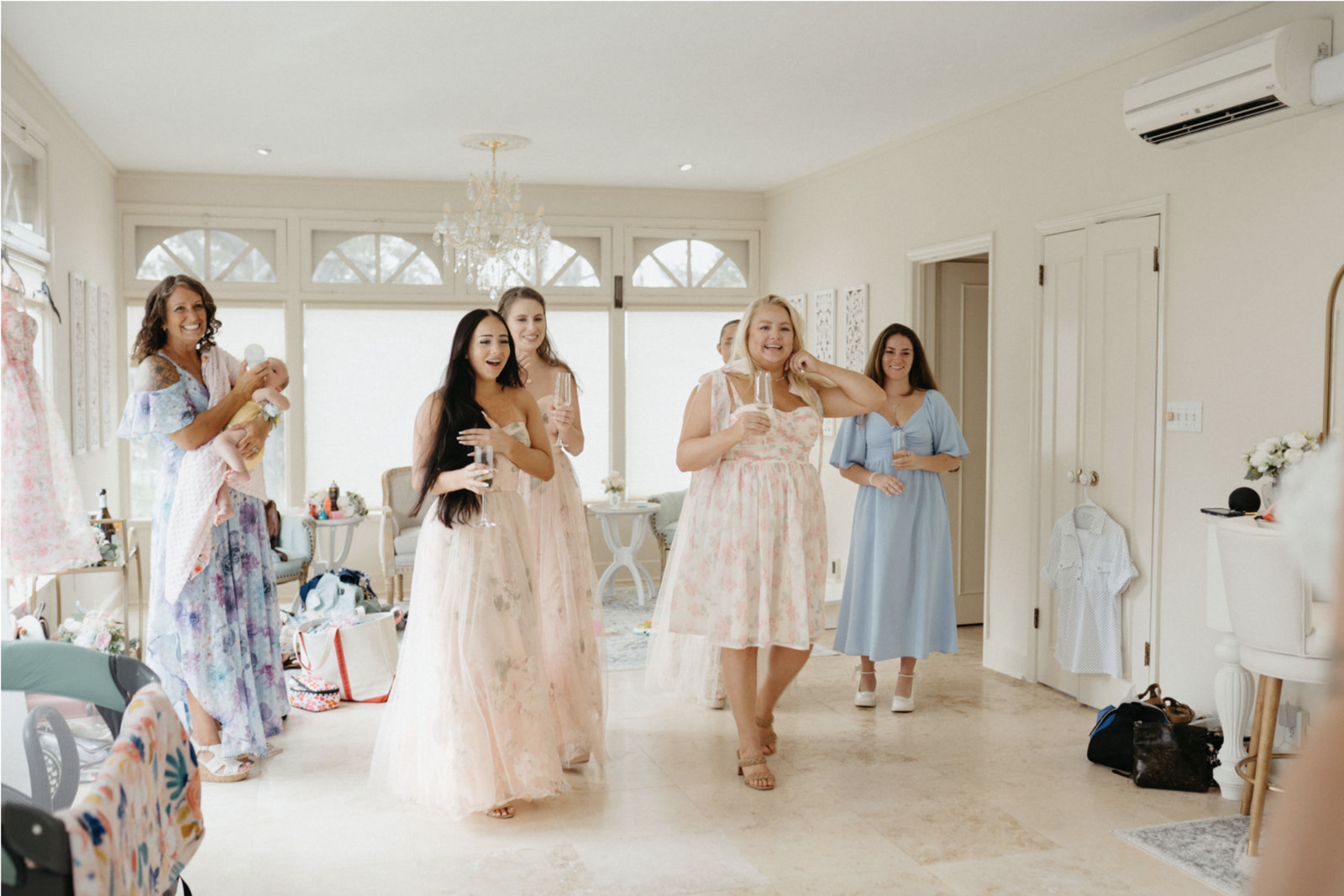 Bridesmaids looking at the bride