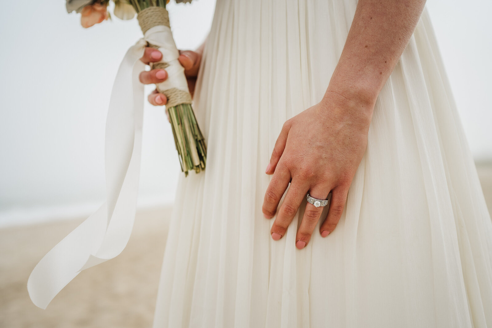 diamond ring on brides hand