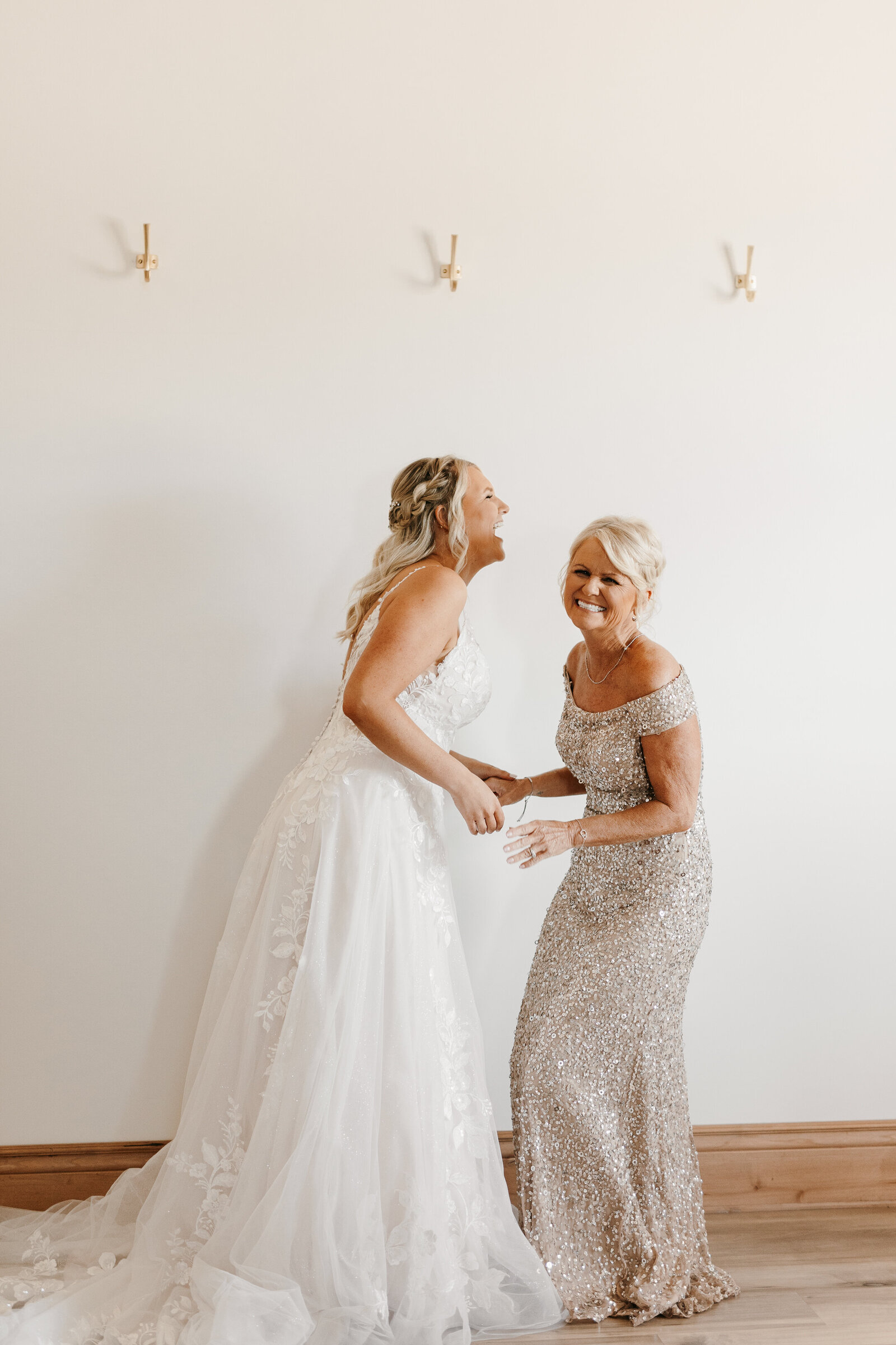 Mom and daughter getting ready on wedding day at Prairie Hill Vineyard - Alex Bo Photo