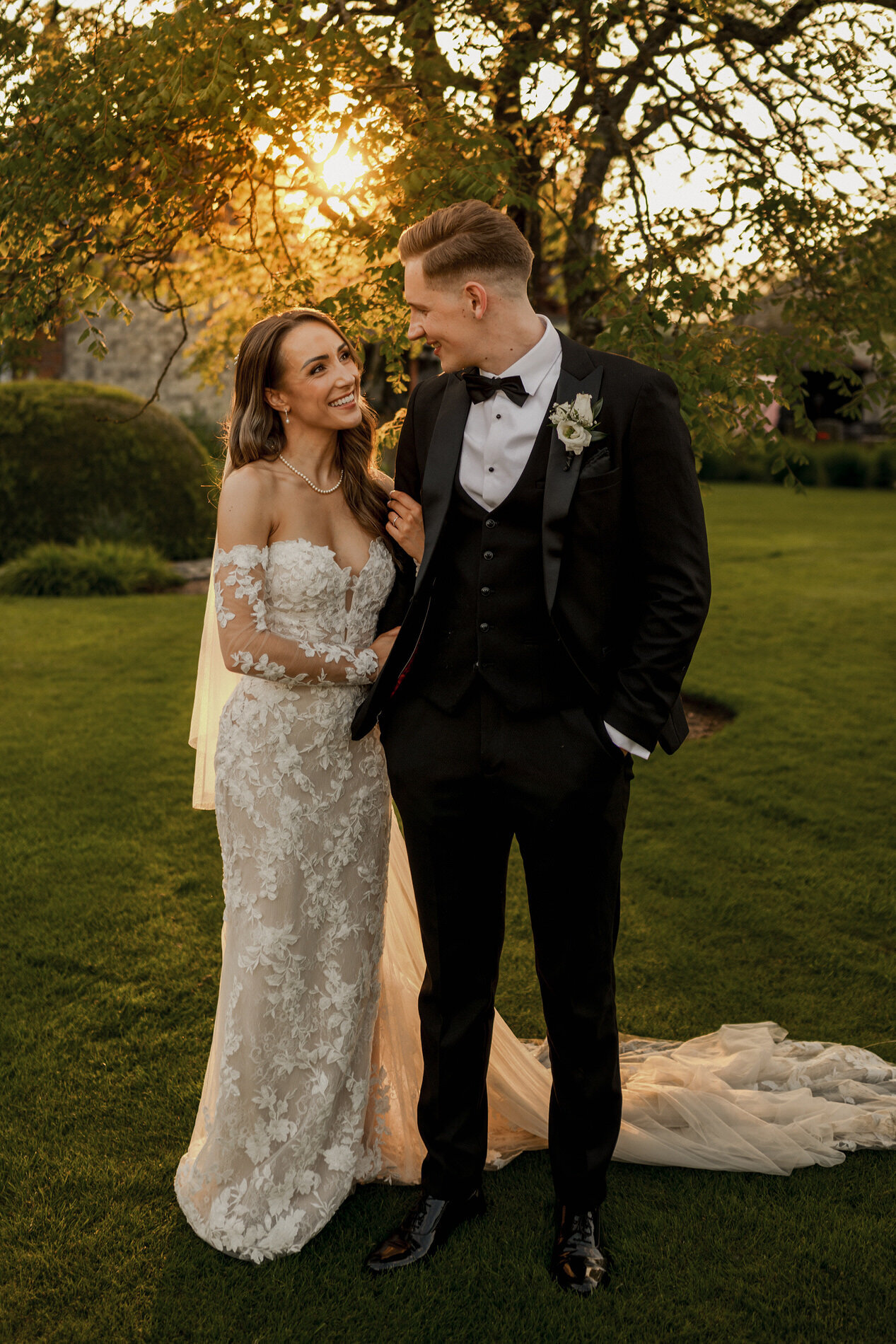 Wedding Photograph of beautiful couple in the gardens at Bury Court at Sunset