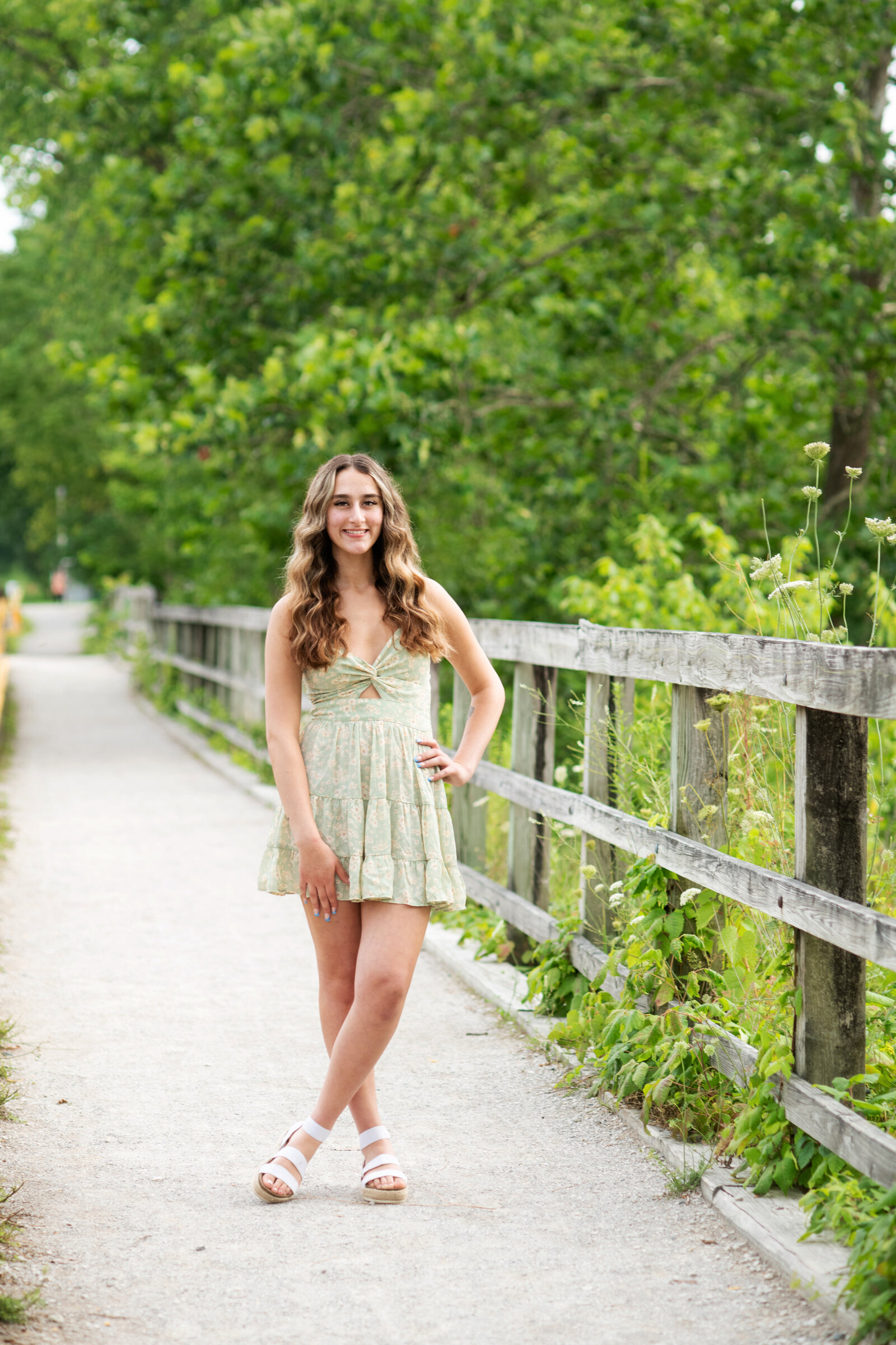 high school senior girls smiles on pathway  in peninsula
