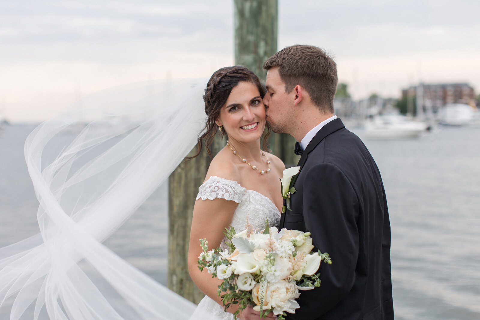 Graduate Annapolis wedding photo of couple at city dock by Maryland photographer Christa Rae Photography