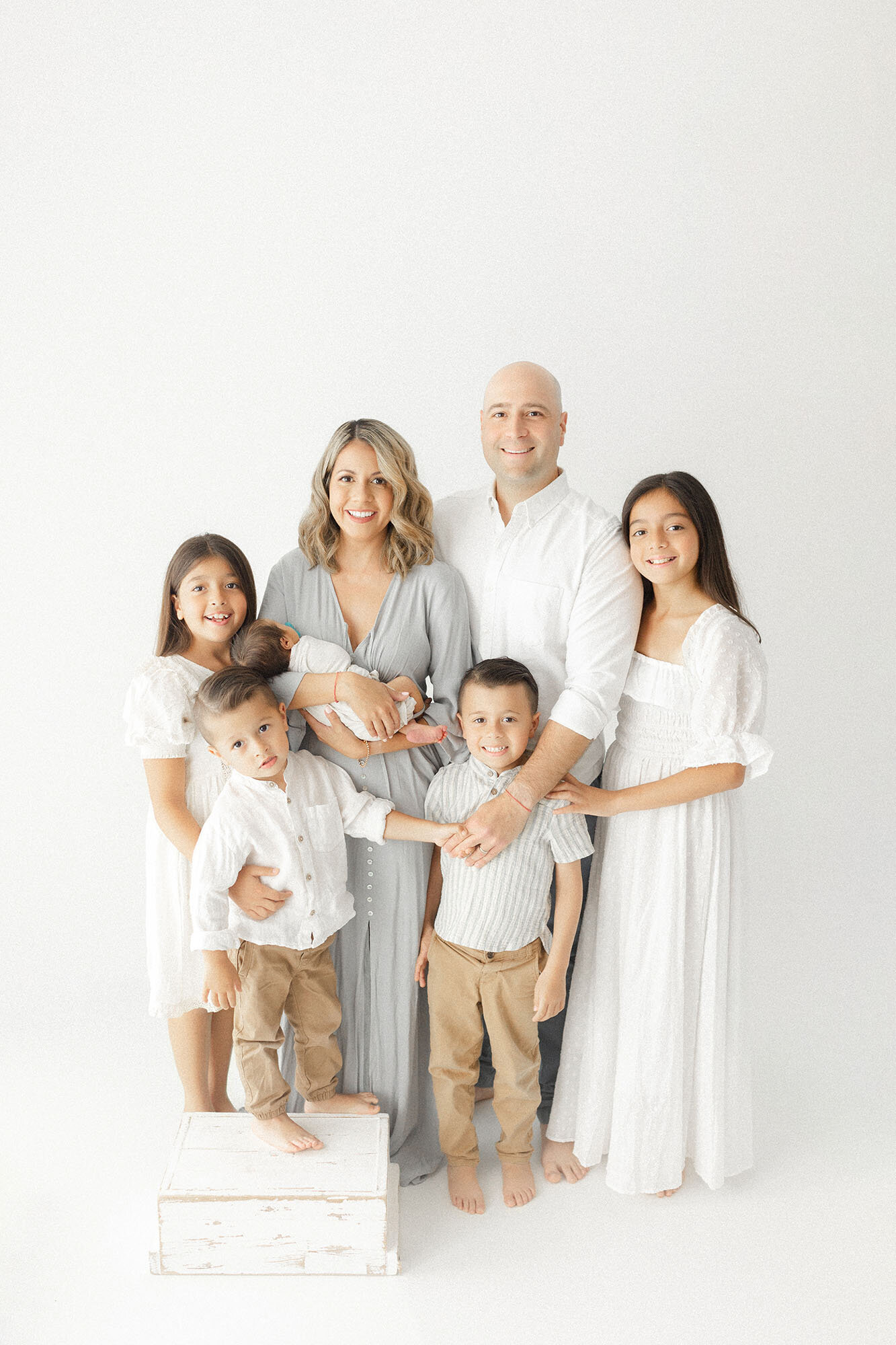 Family of six with newborn baby during studio session | Grand Forks ND newborn photographer Chelsea Nichole