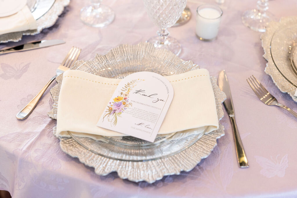An opulent indoor wedding at Central Florida's Luxmore Grande Estate, featuring  stunning tablescape adorned with silk florals, elegant place settings, and romantic lighting. Perfect for couples seeking a luxurious, intimate celebration