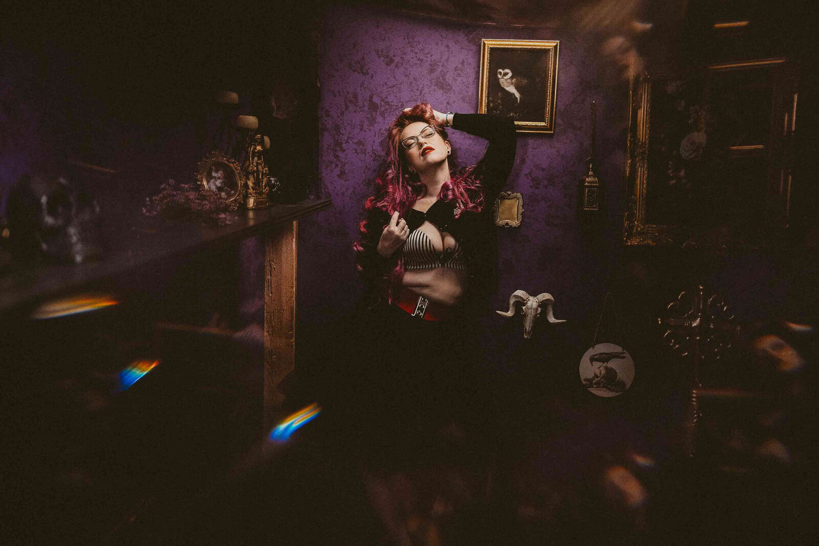 photo of a woman in a room with halloween setup 