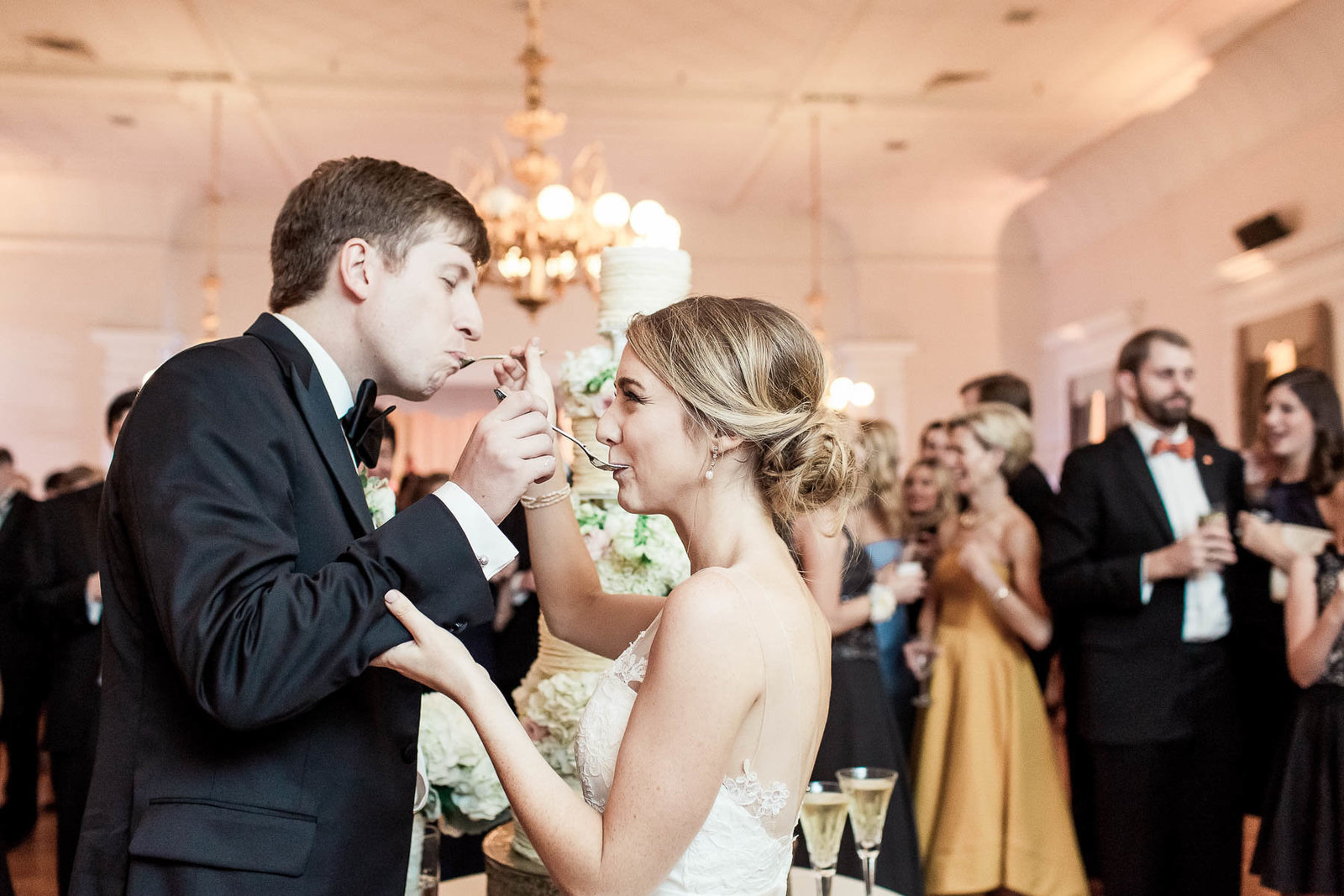 Bride and groom cut the cake, Hibernian Hall, Charleston, South Carolina