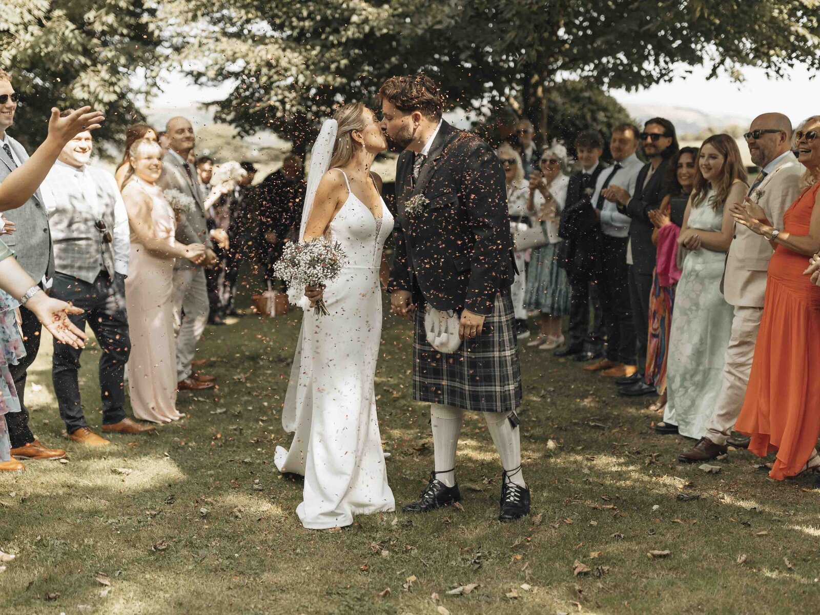 confetti photo outdoor wedding ceremony