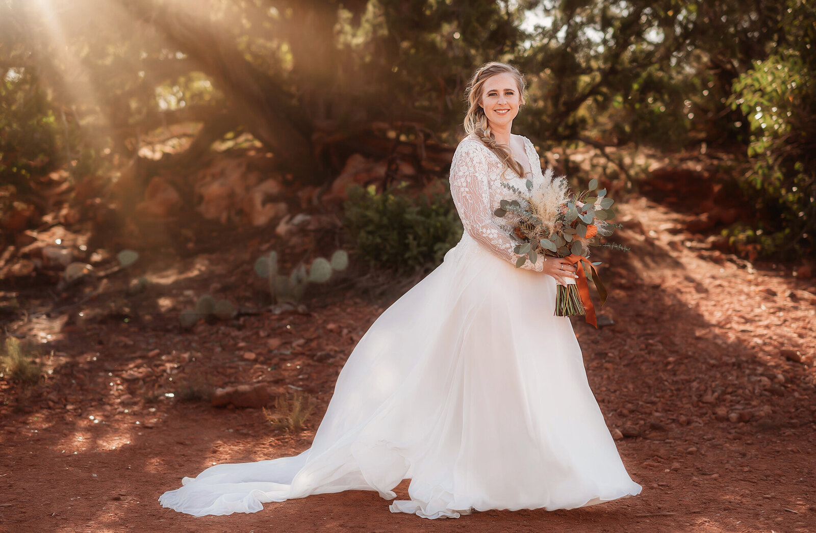 Bride poses for portraits before her Elopement in Sedona, AZ.