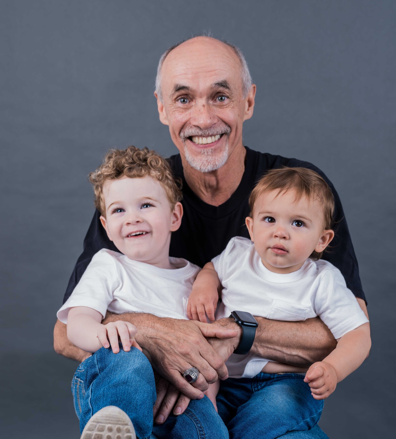 Studio portrait parent two children
