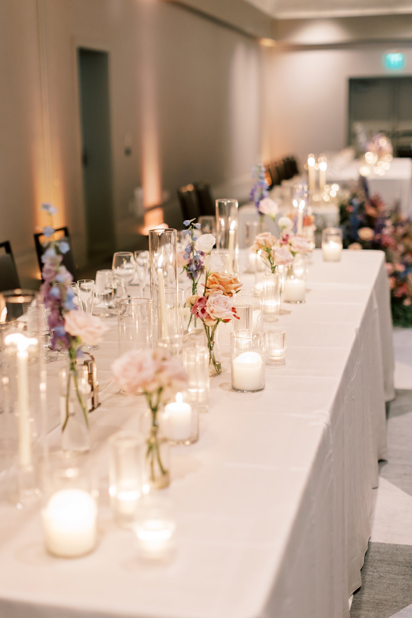flowers-phoenix-az-long reception-table-candles-bud-vases