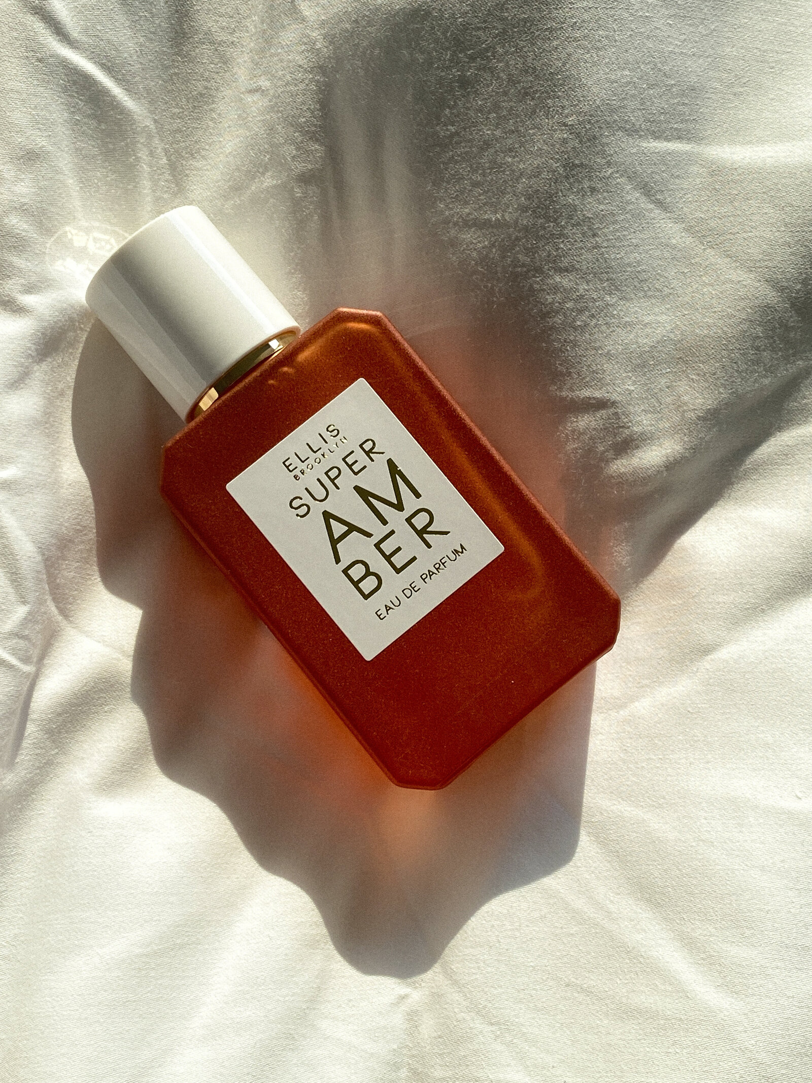 ellis super amber parfum perfume, user generated content, ugc, washington dc content creator, dc bloggers, aesthetic product photography, pin it, aesthetic perfume bottles