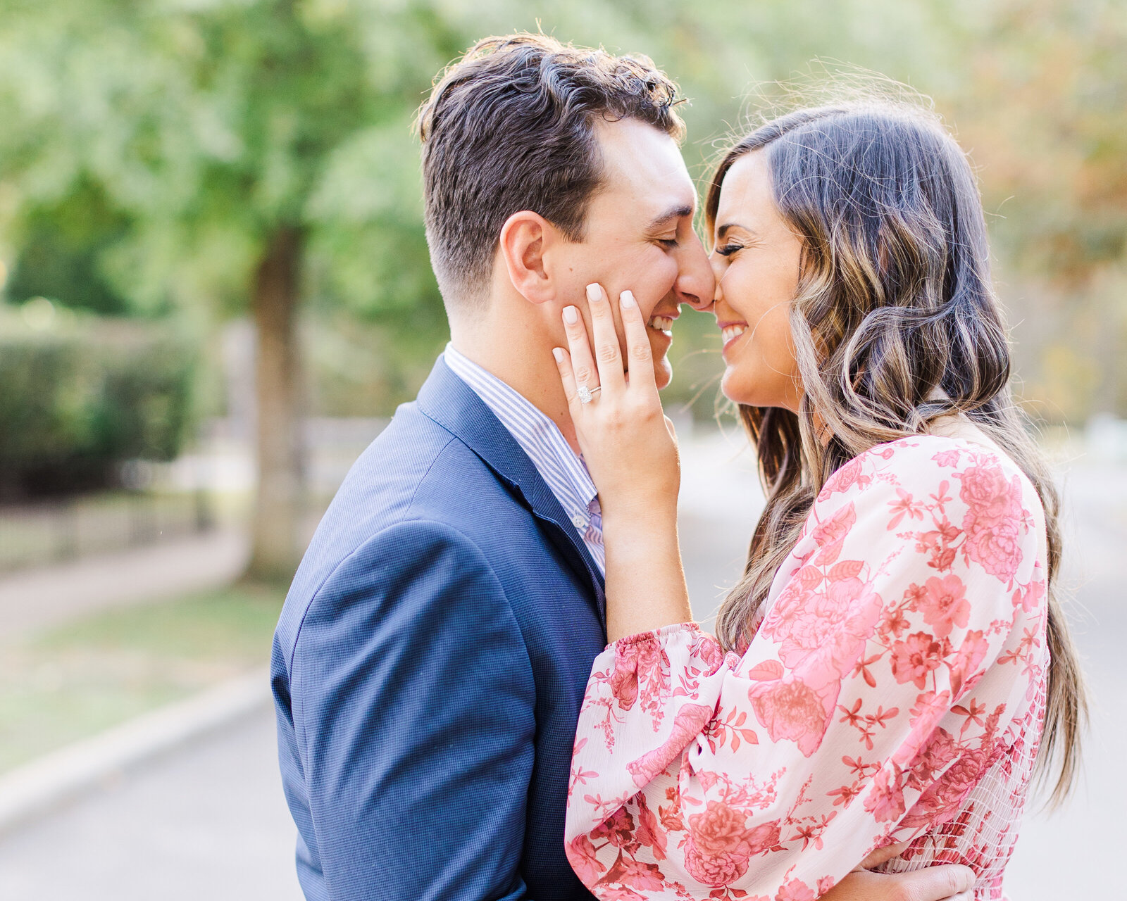 Close-up of Sarah Kate and Thomas sharing a joyful moment during their engagement photoshoot with Abby Bell Photography, Fine Art Wedding Photographer in Alabama.
