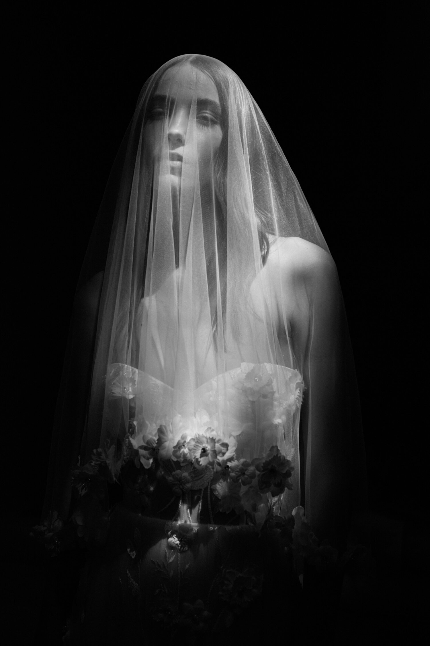 black and white image bride wearing veil