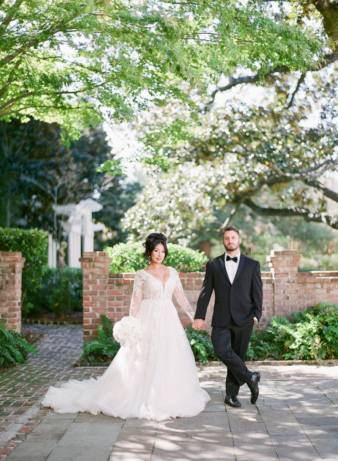 Bride and Groom Holding Hands at William Aiken House