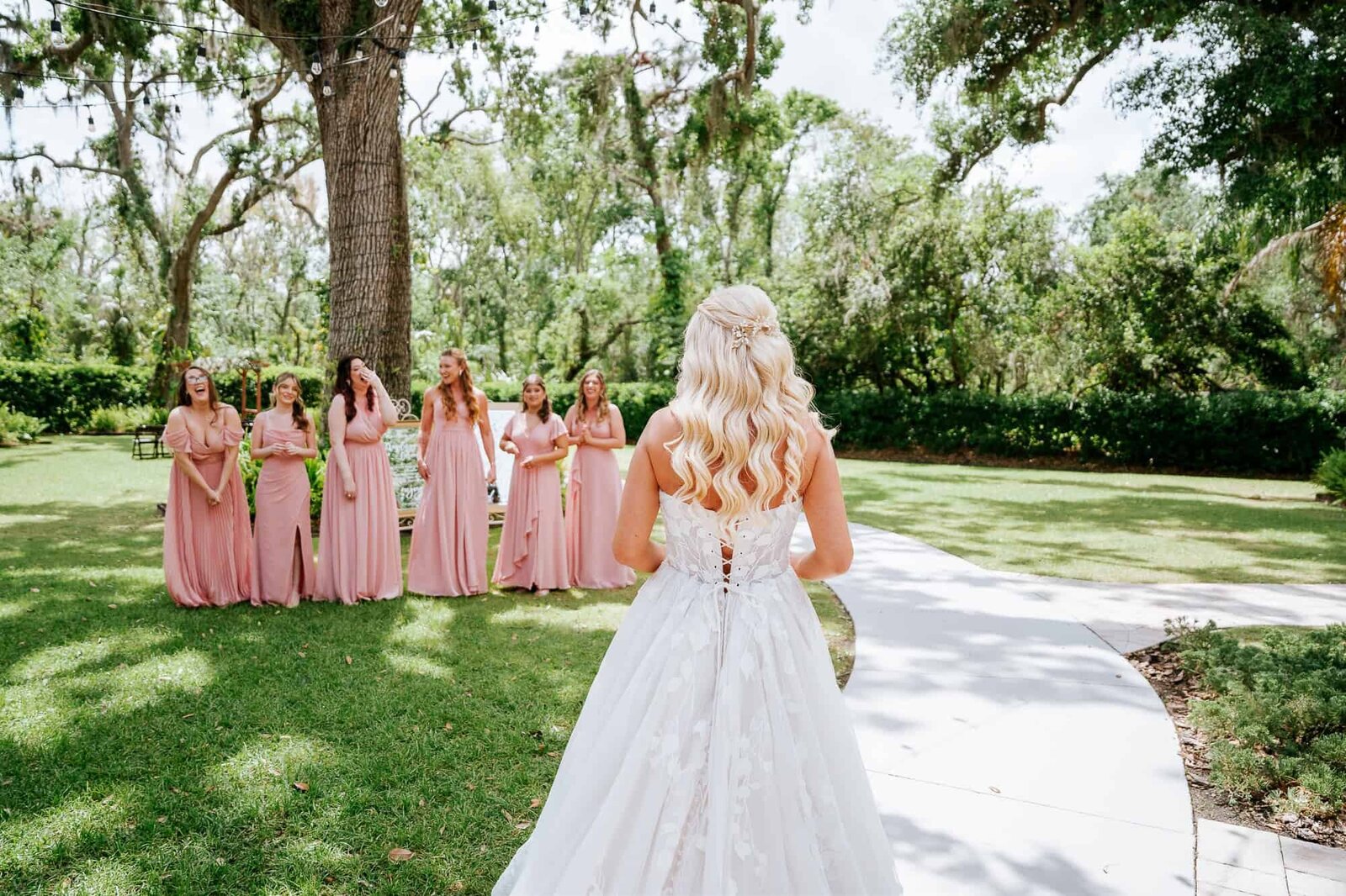 Bride reveal with bridesmaids at bakers ranch wedding 