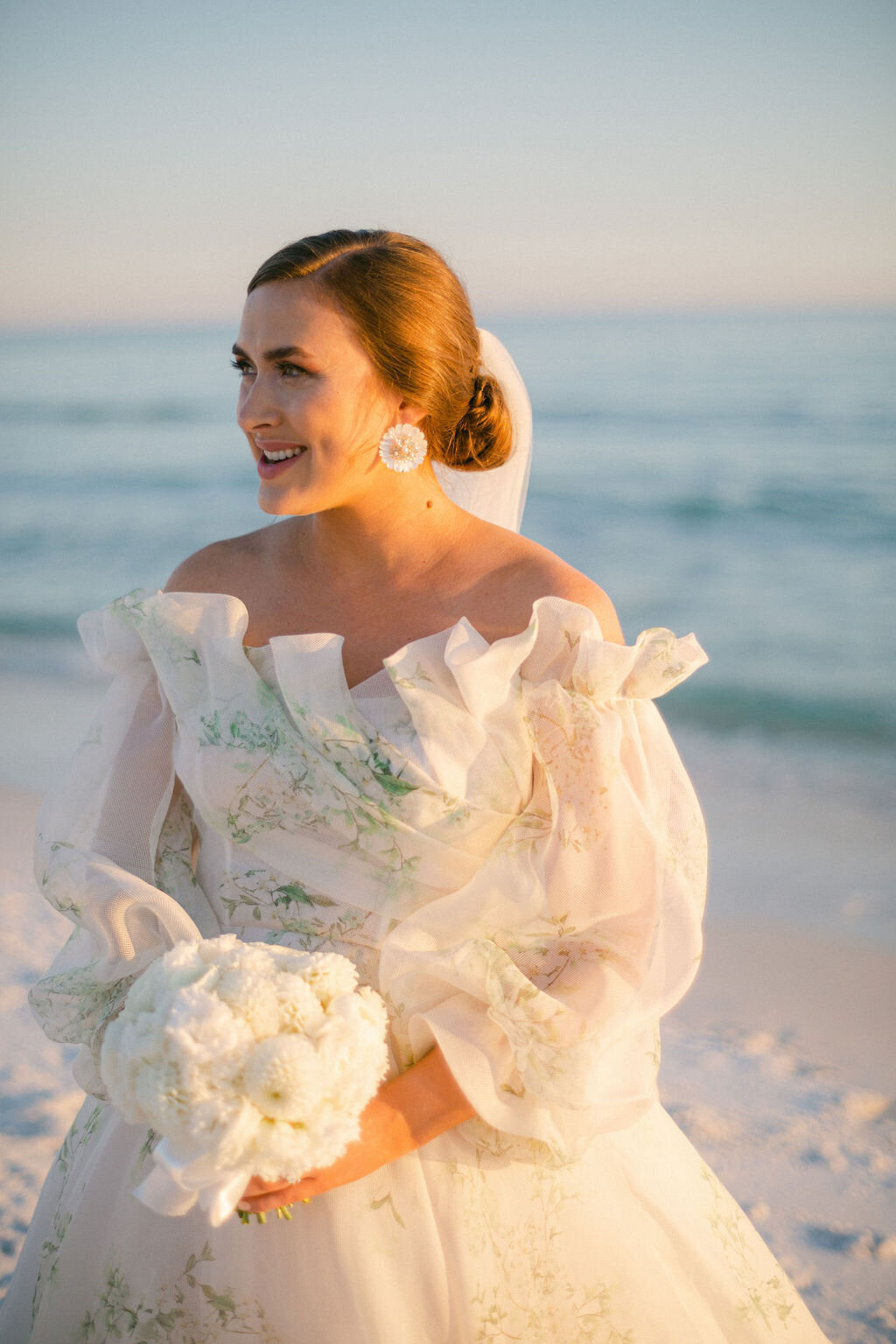 Bride in a floral pattern gown for a beach wedding in Florida