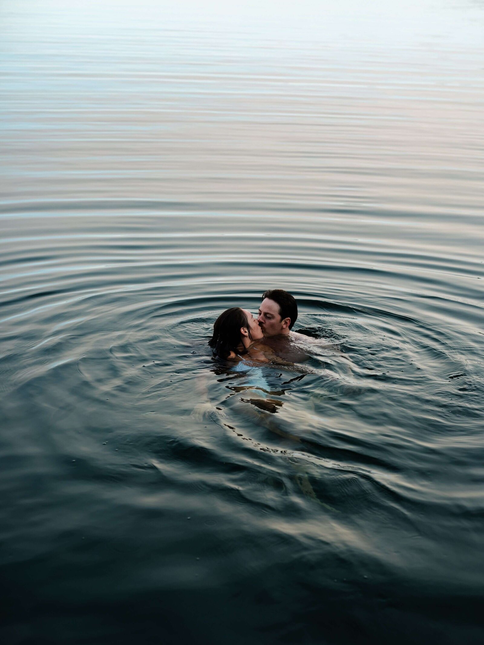 Couple-swimming-on-their-wedding-day-in-Southern-California