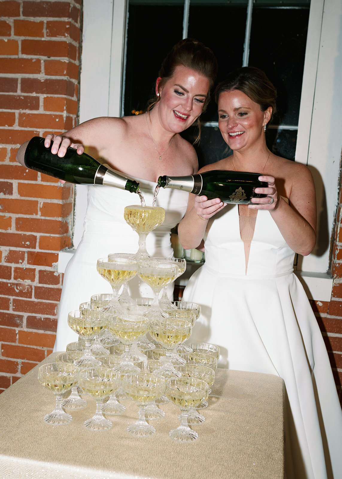 pouring-champagne-tower-wedding