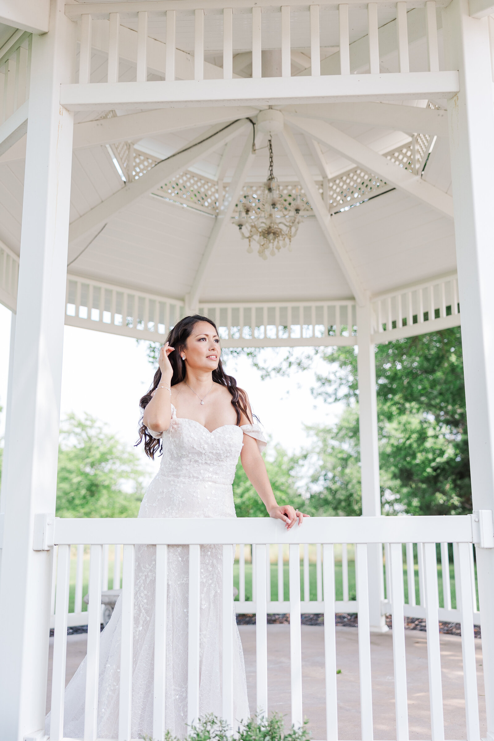 Intercultural wedding bride solo photography outdoor