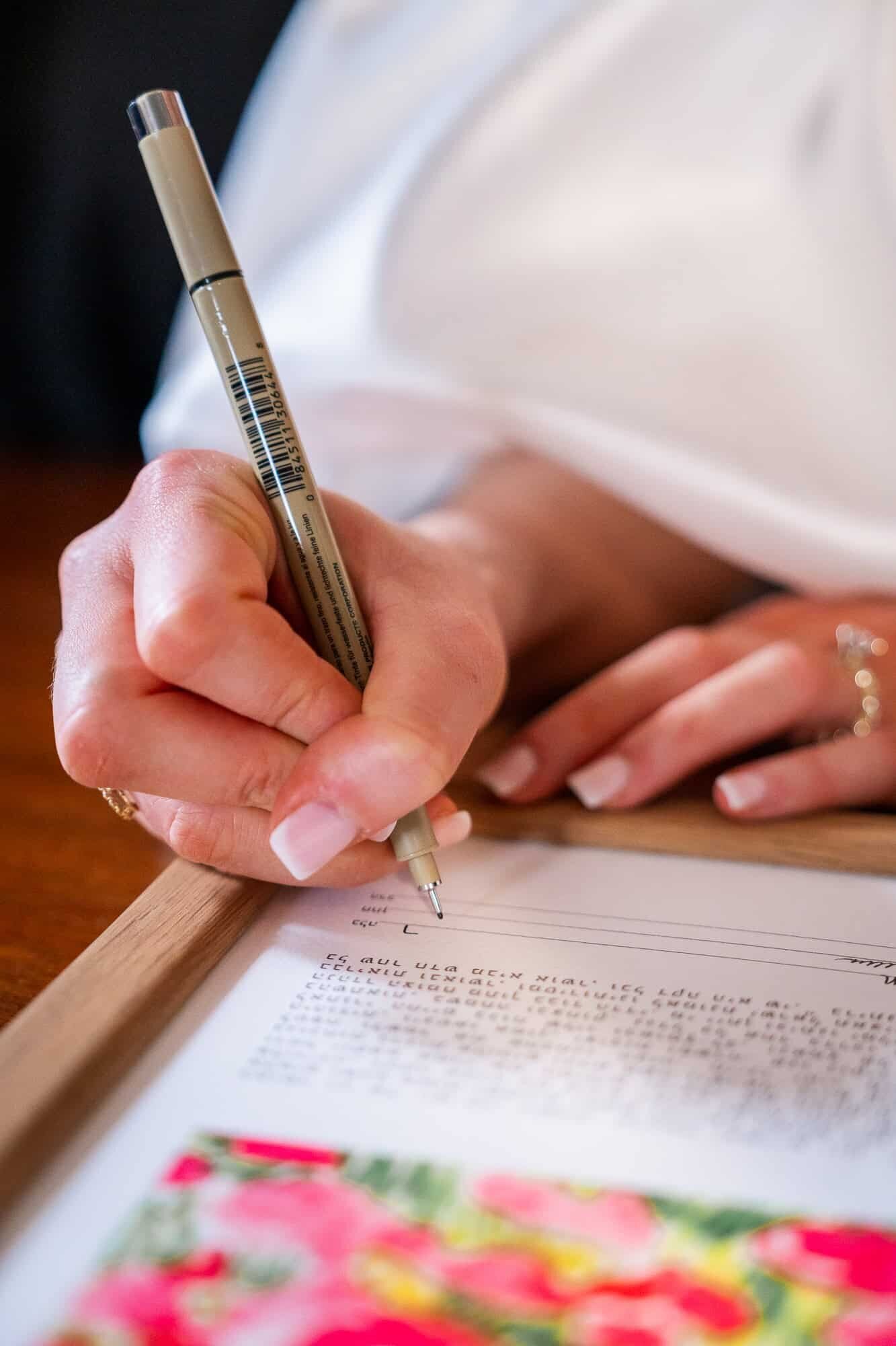 signing of the Ketubah at jewish wedding - Casa Monica Wedding venue in St Augustine