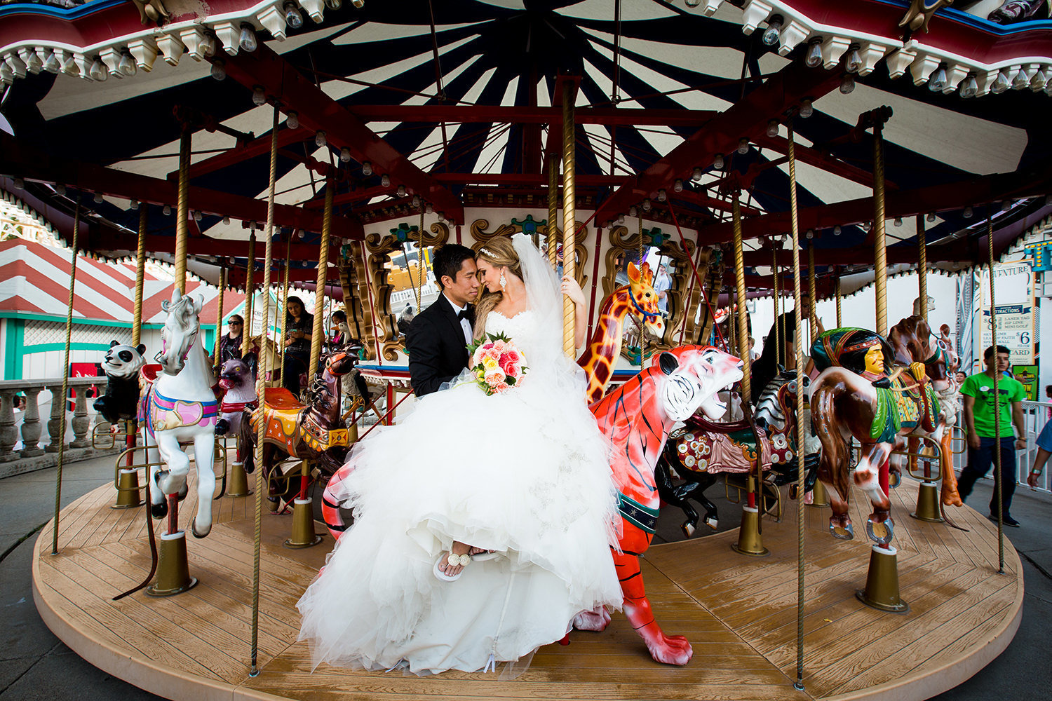 bride and groom on ferrels wheel