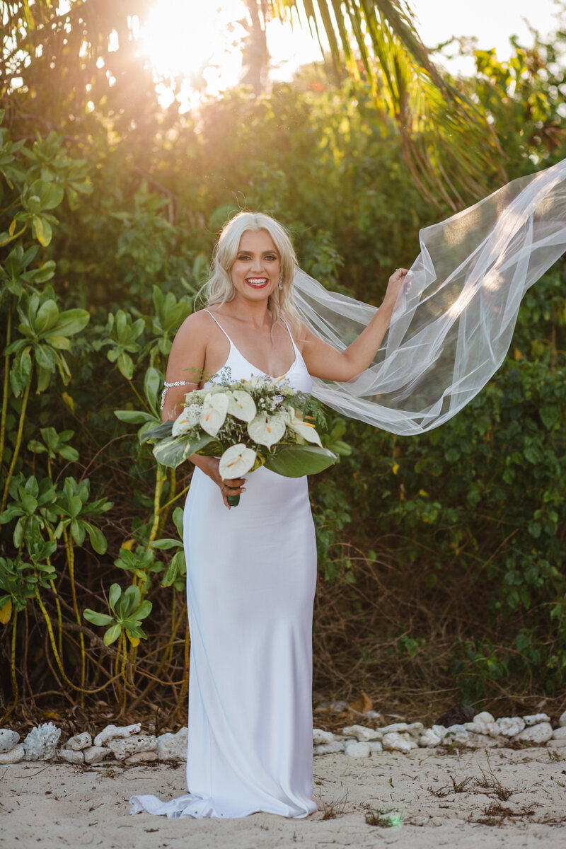 Bride with veil blowing