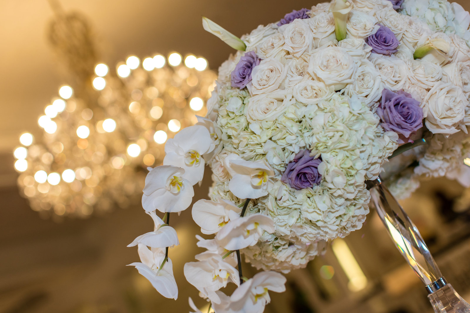 white hydrangeas, purple and ivory roses, lily
