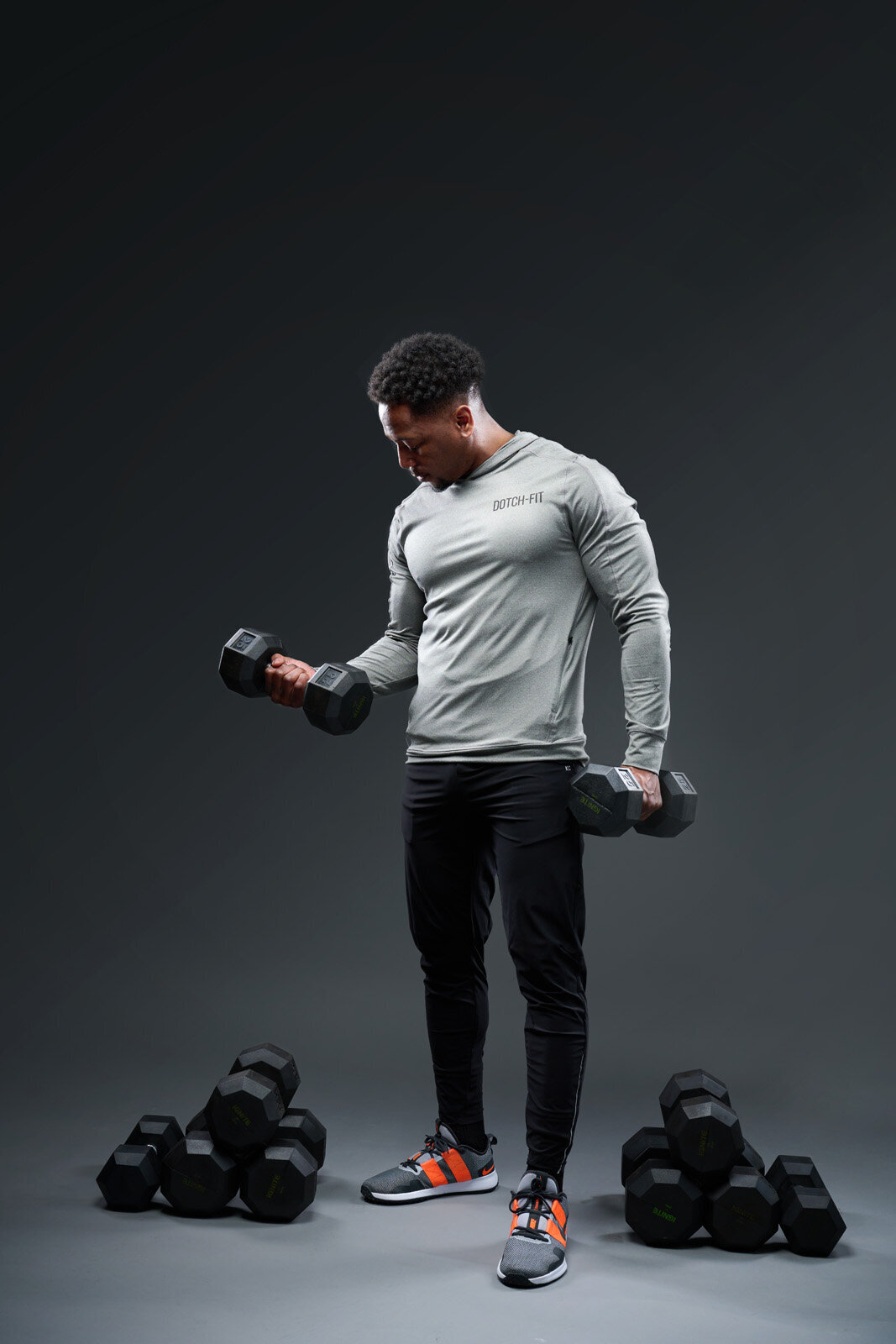 Headshot Photographer Captures Fitness Enthusiast Lifting Weights in Minneapolis Studio-25