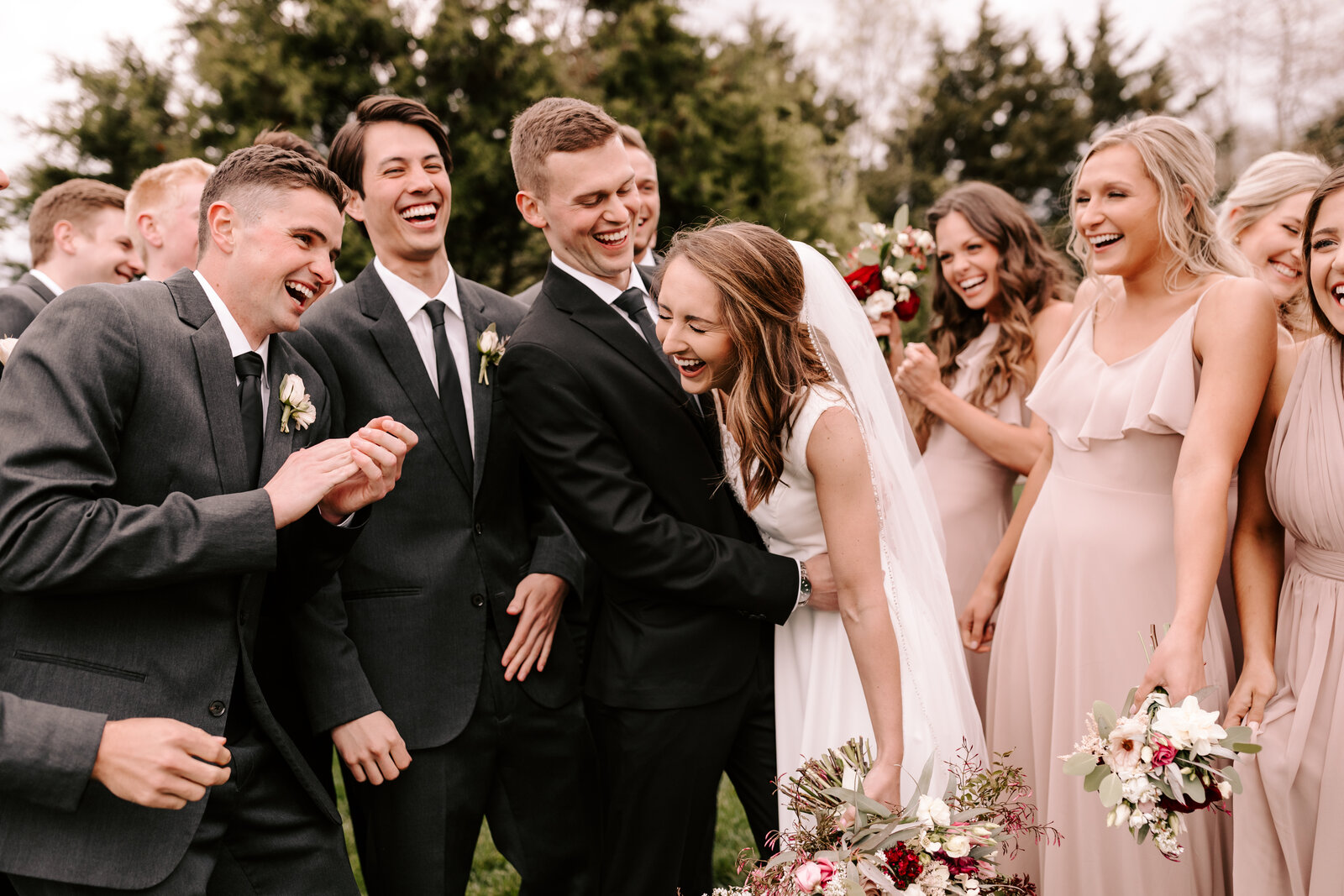 photo of bridal party laughing