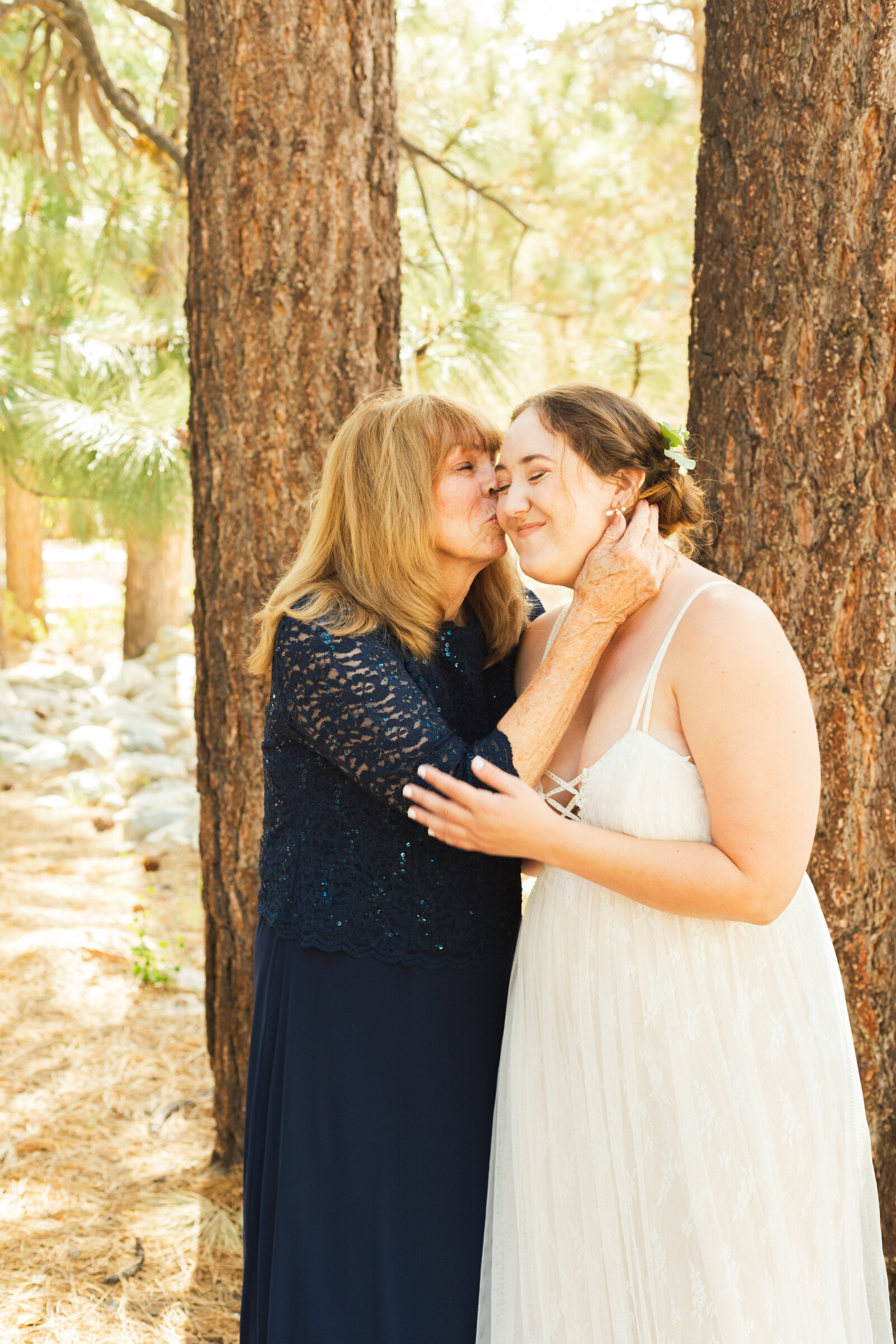A boho bride celebrates her intimate elopement at a cabin at Big Bear Lake, California.