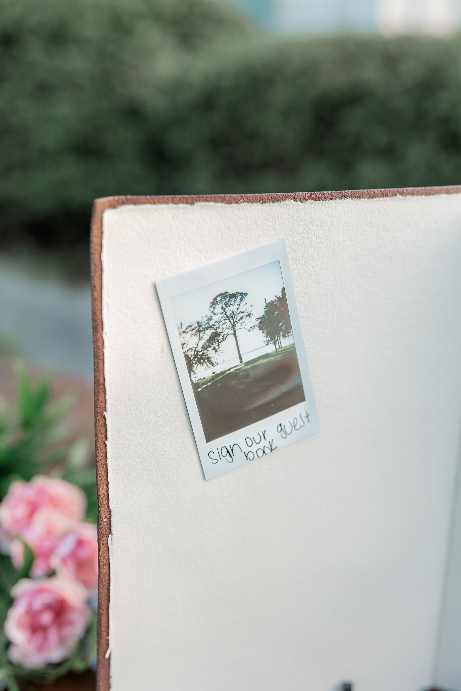 wedding guest book with polaroids