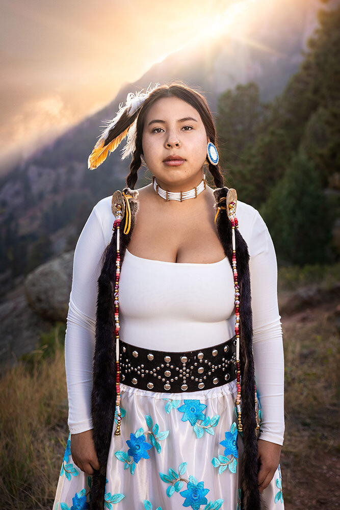 native-american-young-woman-senior-high-school-yearbook-lakota-tribe-feather-hair-backlight-sunburst-mountain-proud-beautiful-braided-hair-noble