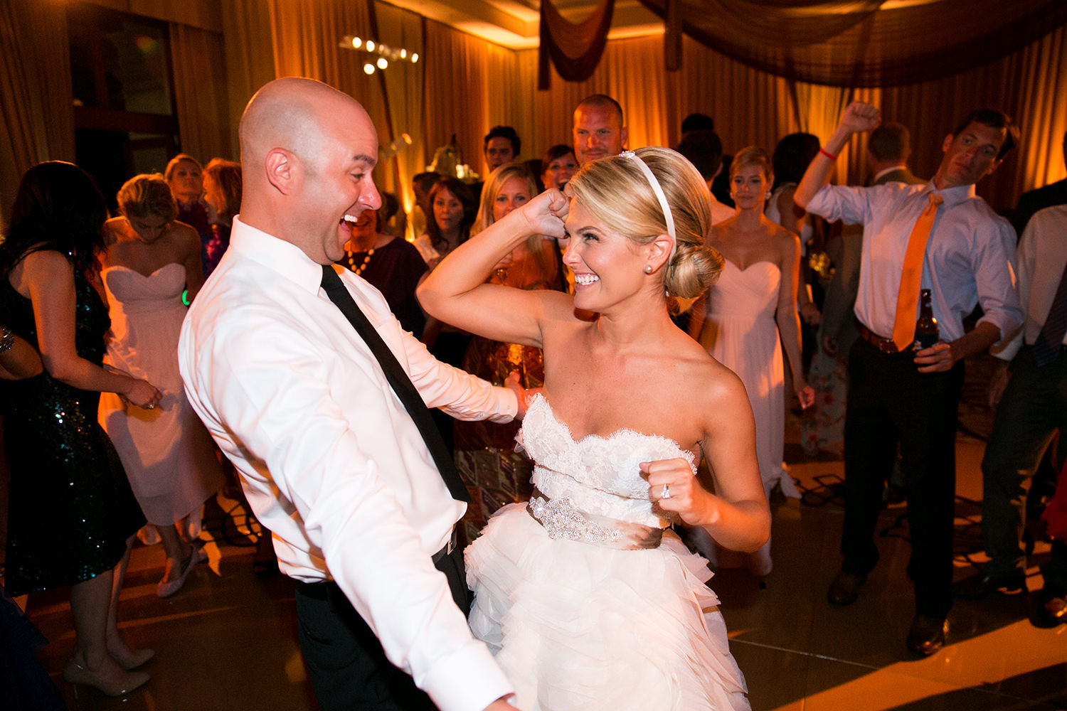 Open dancing at the wedding reception with great uplighting