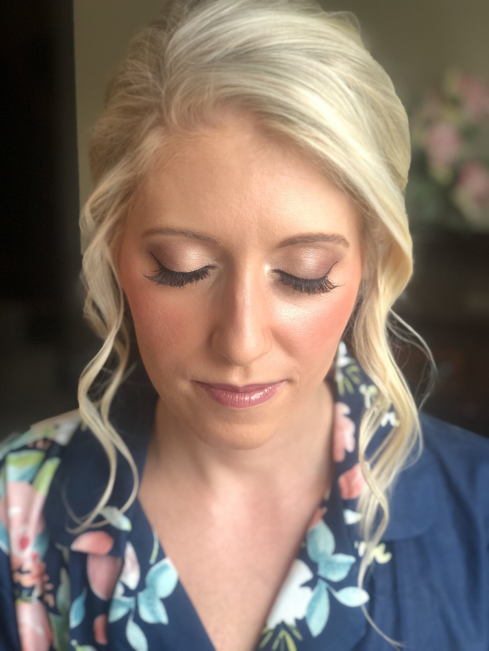 Blonde bridesmaid hair and makeup with face framing curls, soft glam eyeshadow, airbrush makeup Bridal hair stylist Kansas City