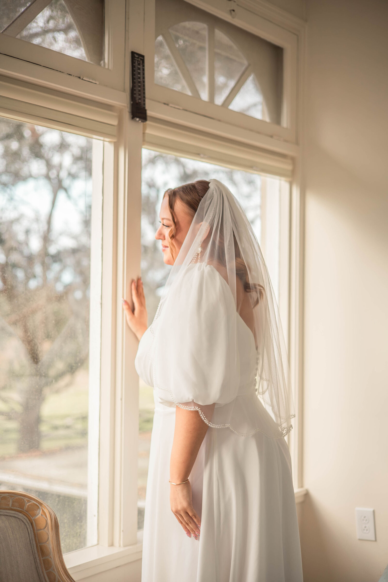 bride looking out the window