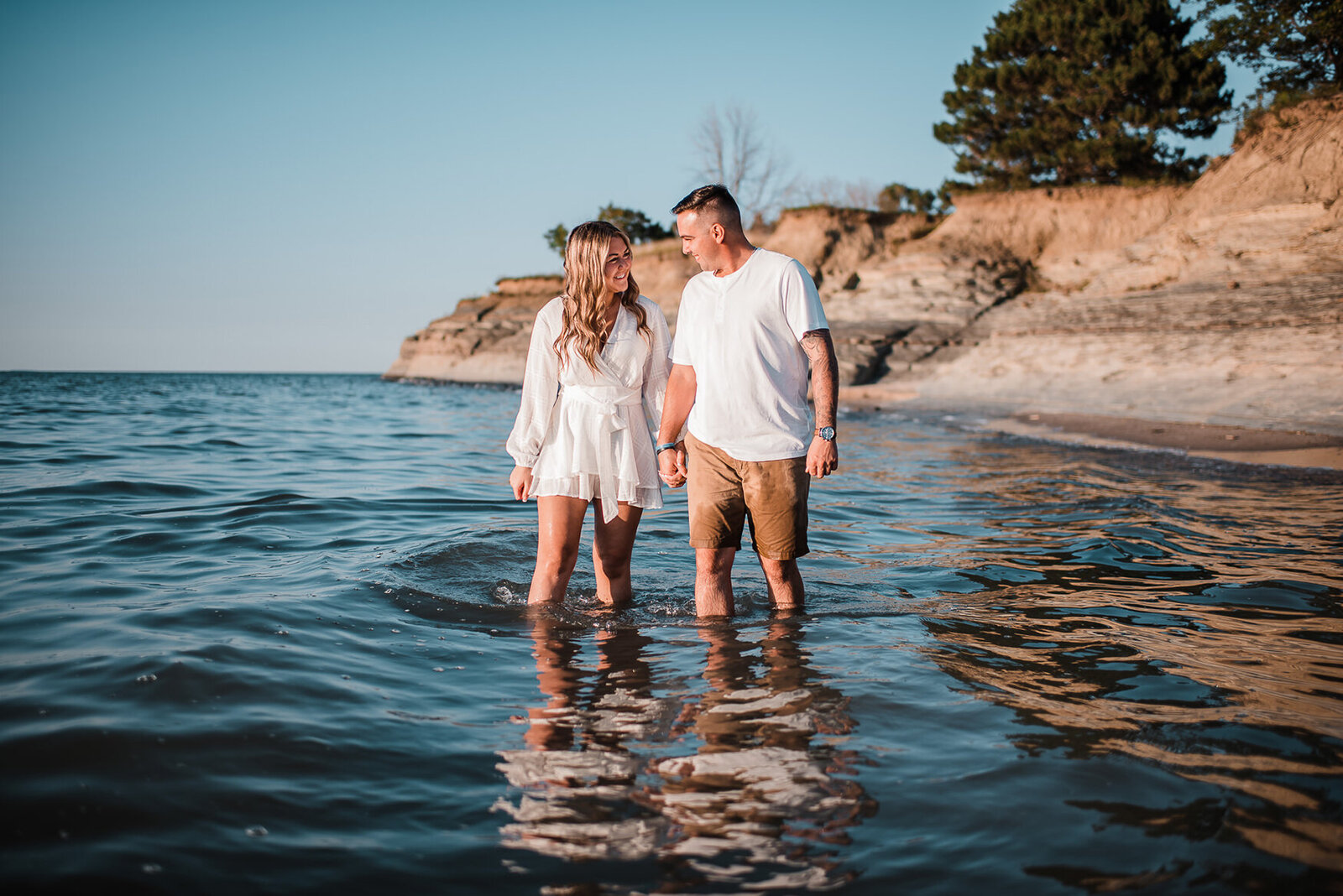 couple walks in water