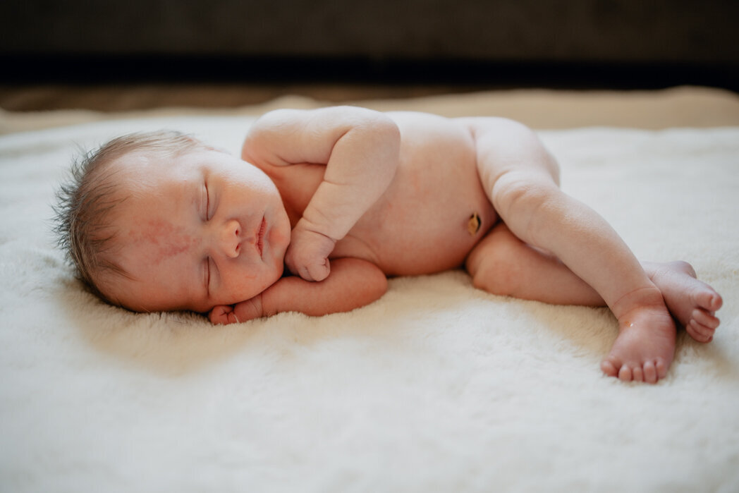 In home lifestyle newborn photographer offering relaxed and comfortable photography experience