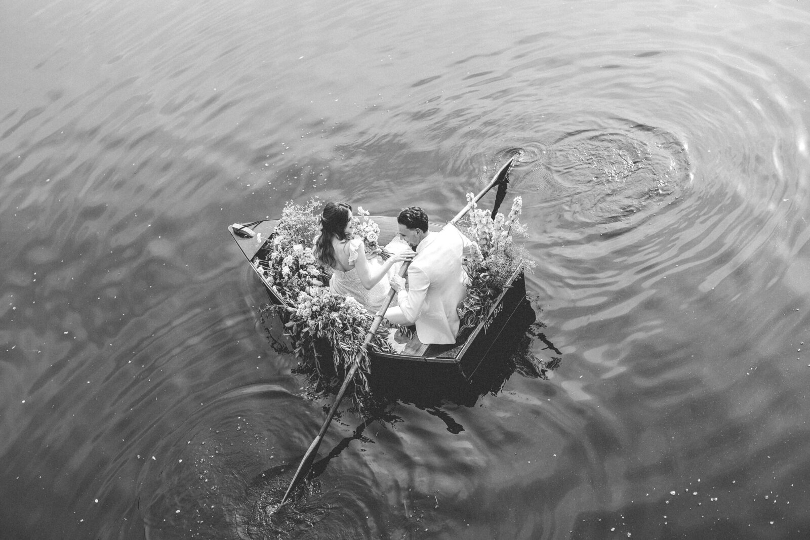 Euridge-Manor-wedding-bride-and-groom-in-boat