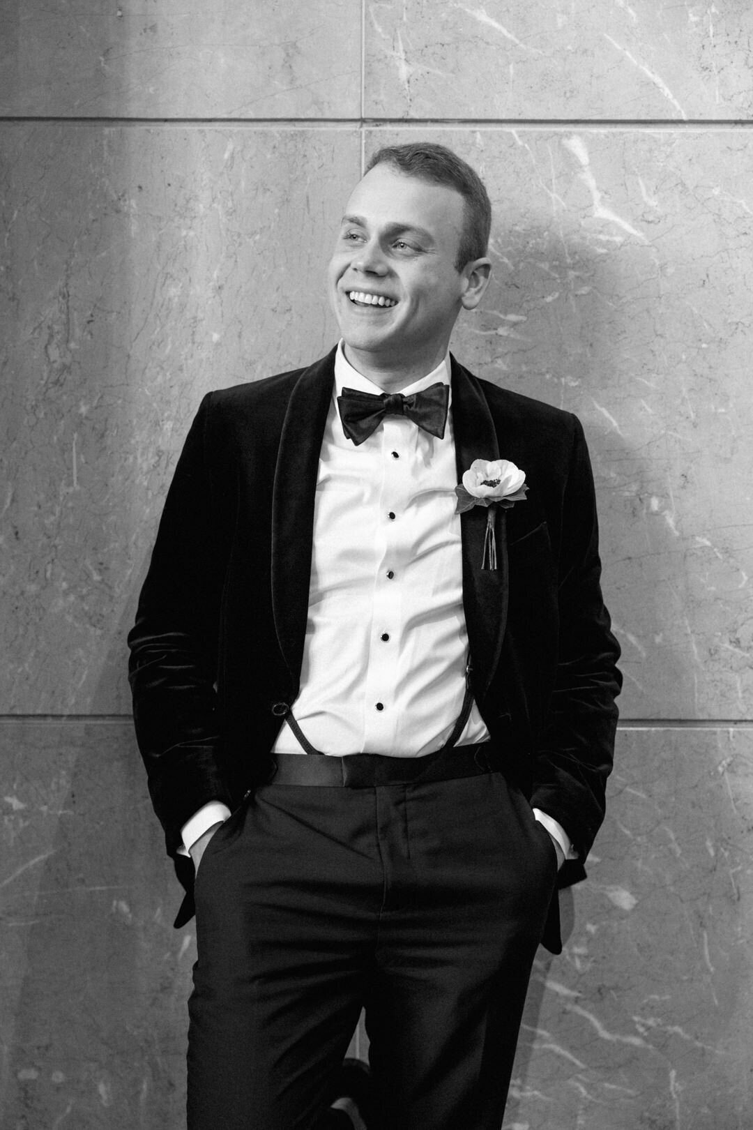 Black and white of Groom Smiling at St. Regis in Atlanta