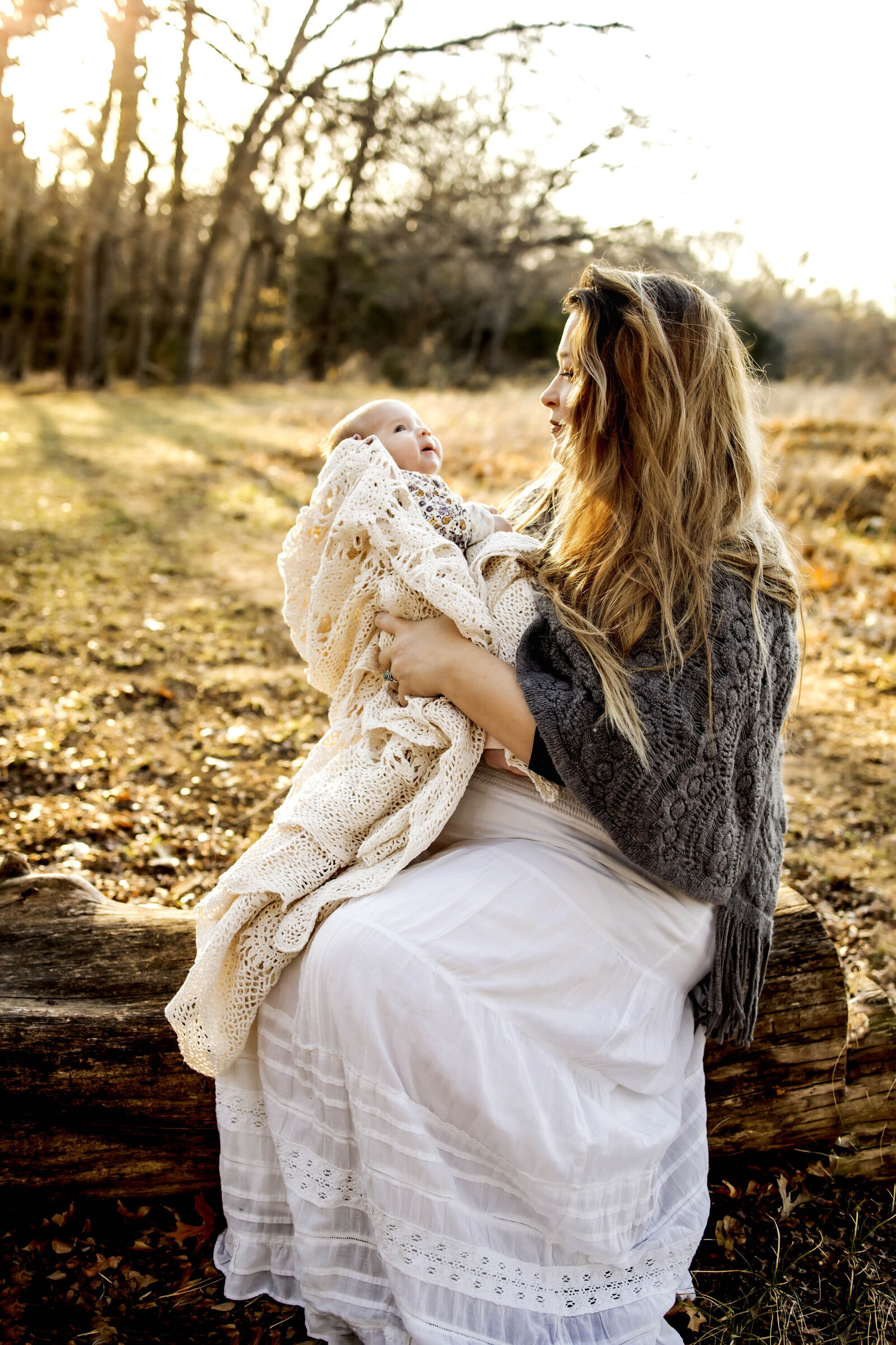 new mom and baby at an outdoor session