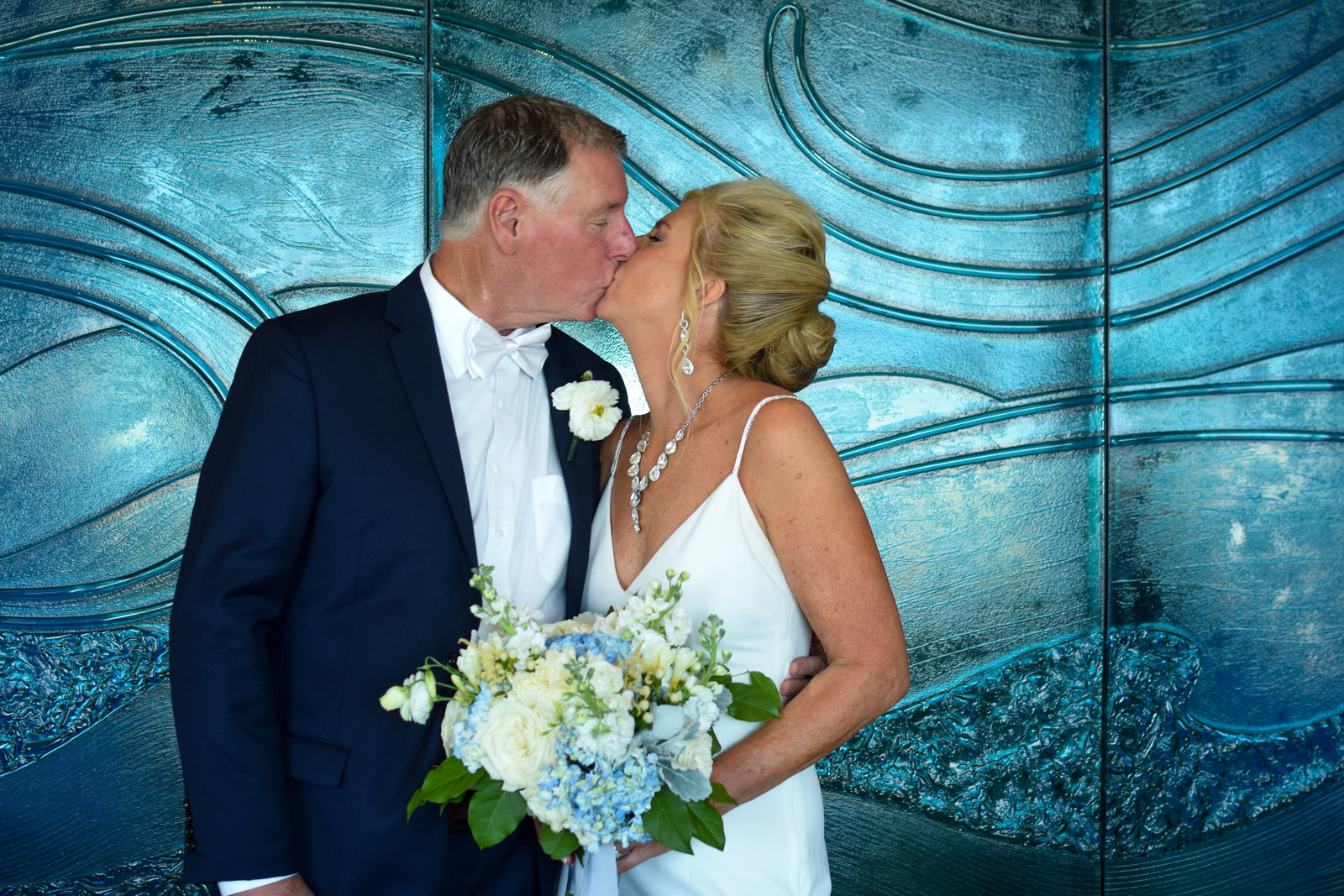 Wedding Bride & Groom Portrait kissing One Ocean Resort Jacksonville Florida