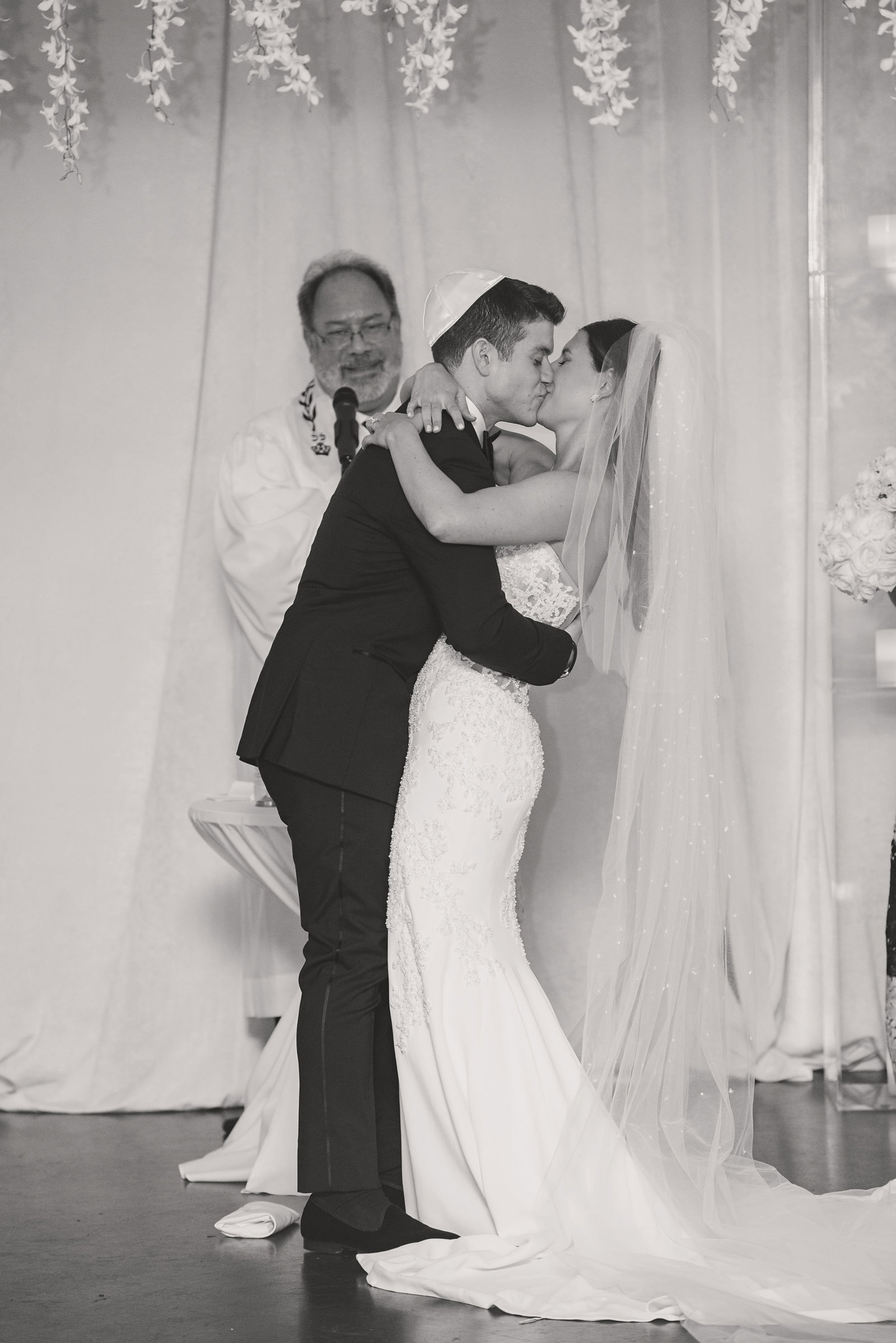 bride and groom kissing "I do" at Glen Head Country Club
