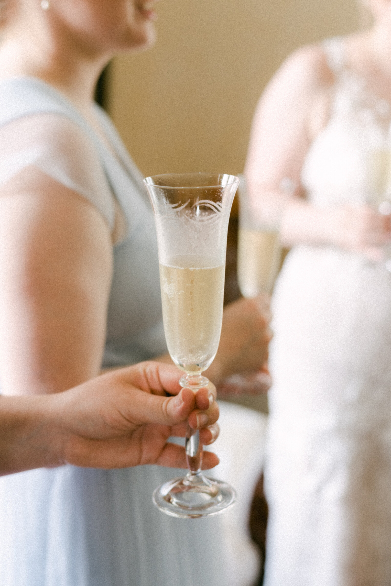 A champagne glass in an image photographed by wedding photographer Hannika Gabrielsson.