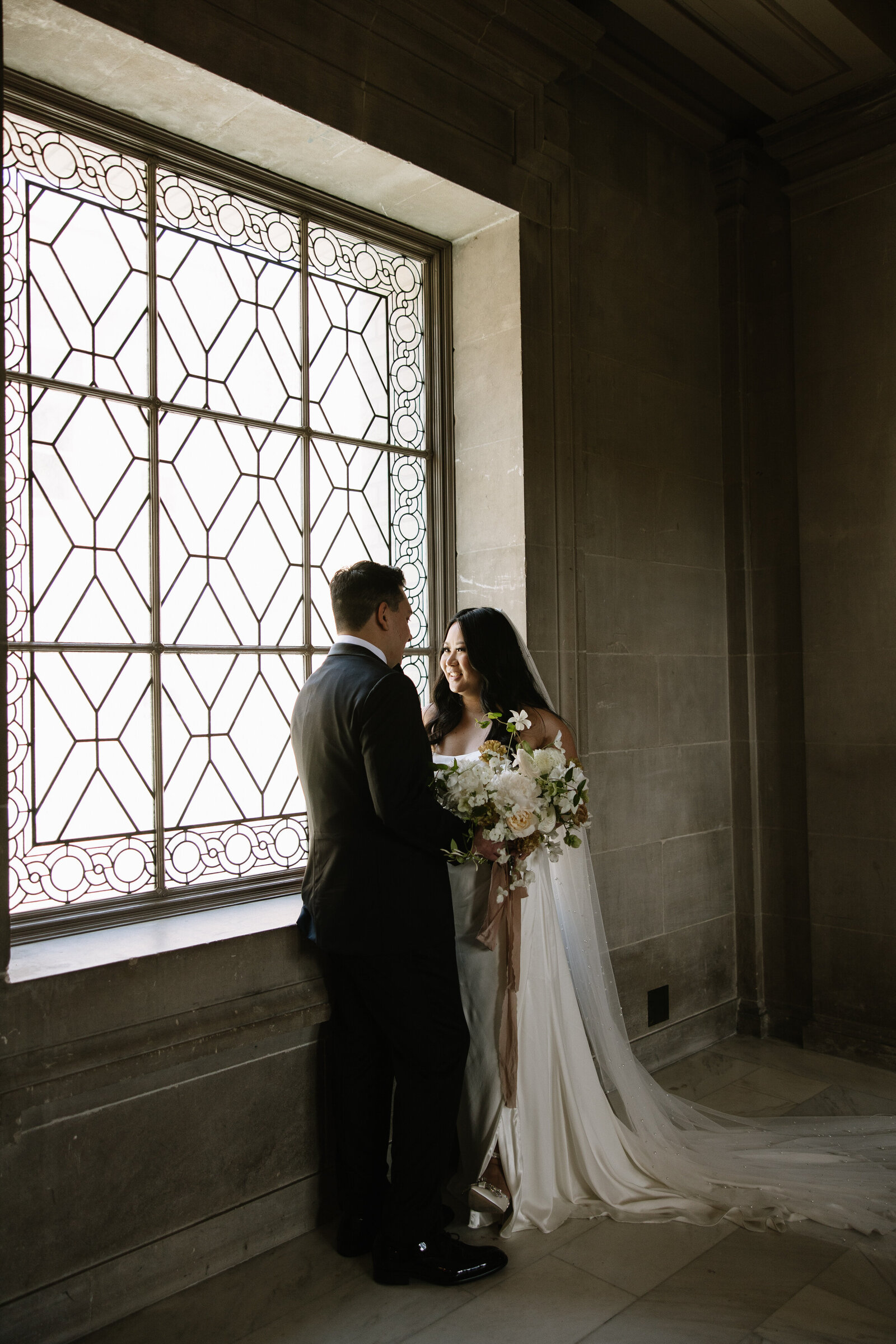 Bride and groom first look at San Francisco City Hall elopement