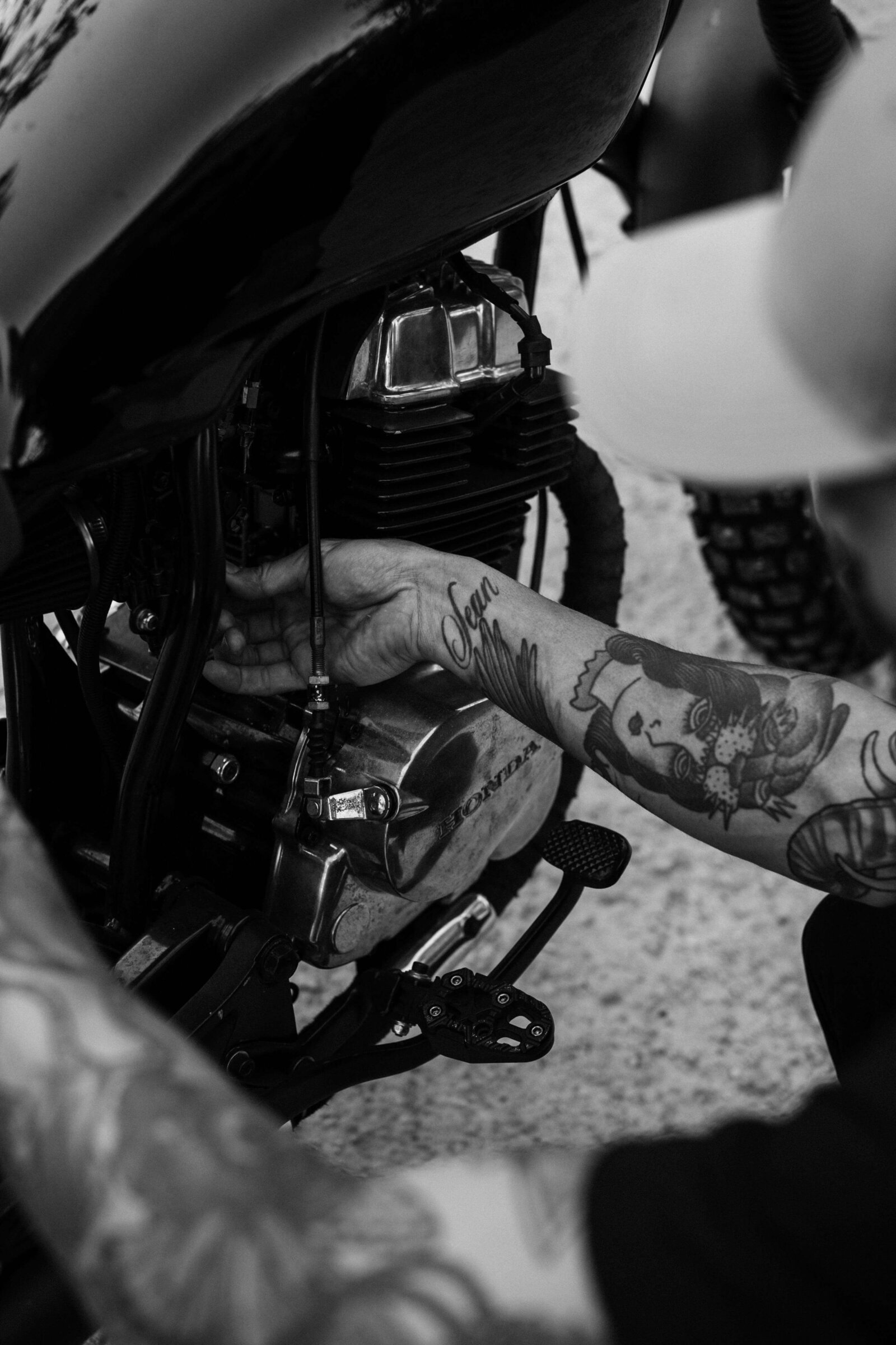 black-and-white-mechanic-repairing-machine