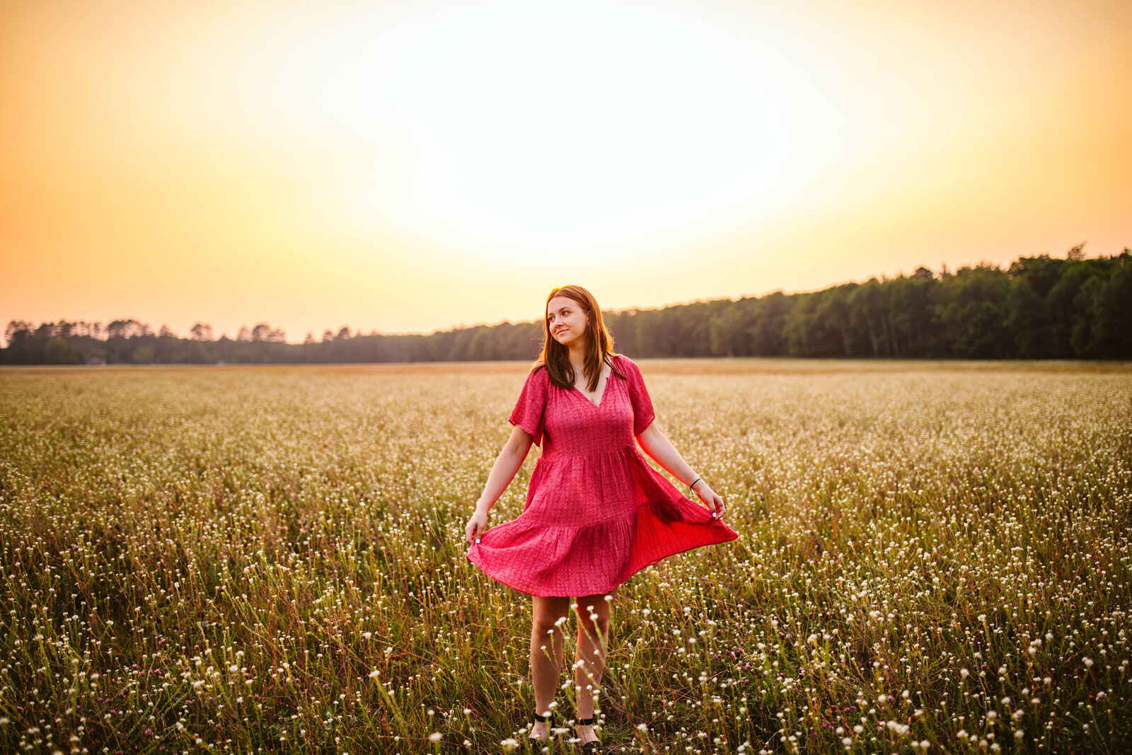 High school senior girl standing in a flower field - Park Rapids, Minnesota