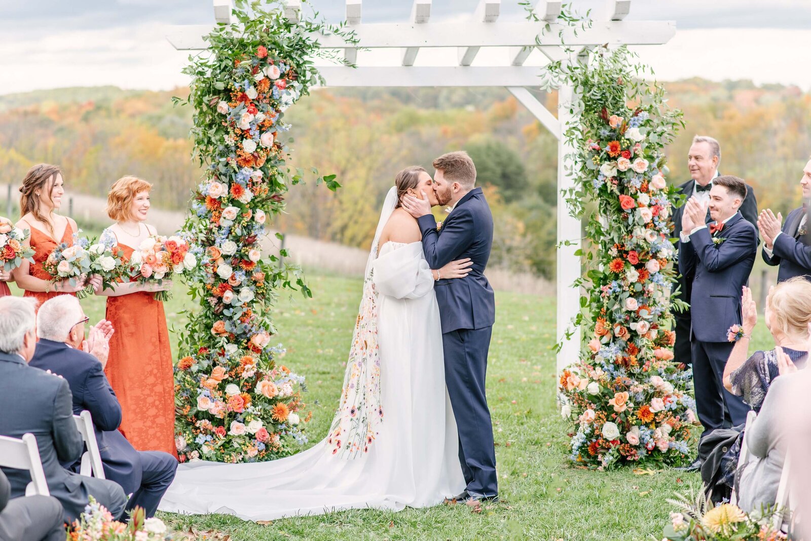 colorful fall wedding orange rust and blue luxury